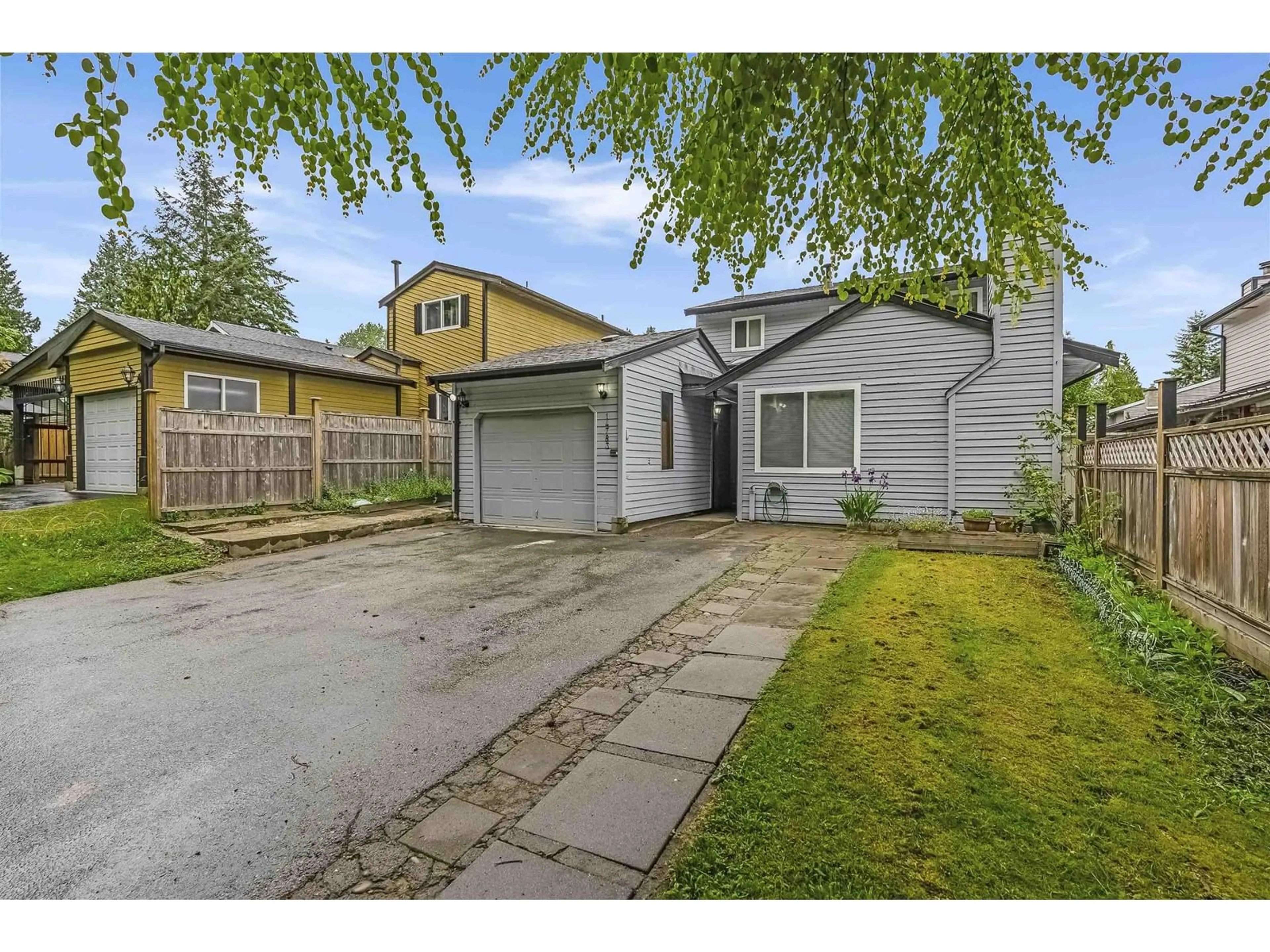 A pic from outside/outdoor area/front of a property/back of a property/a pic from drone, street for 14783 101, Surrey British Columbia V3R7H7