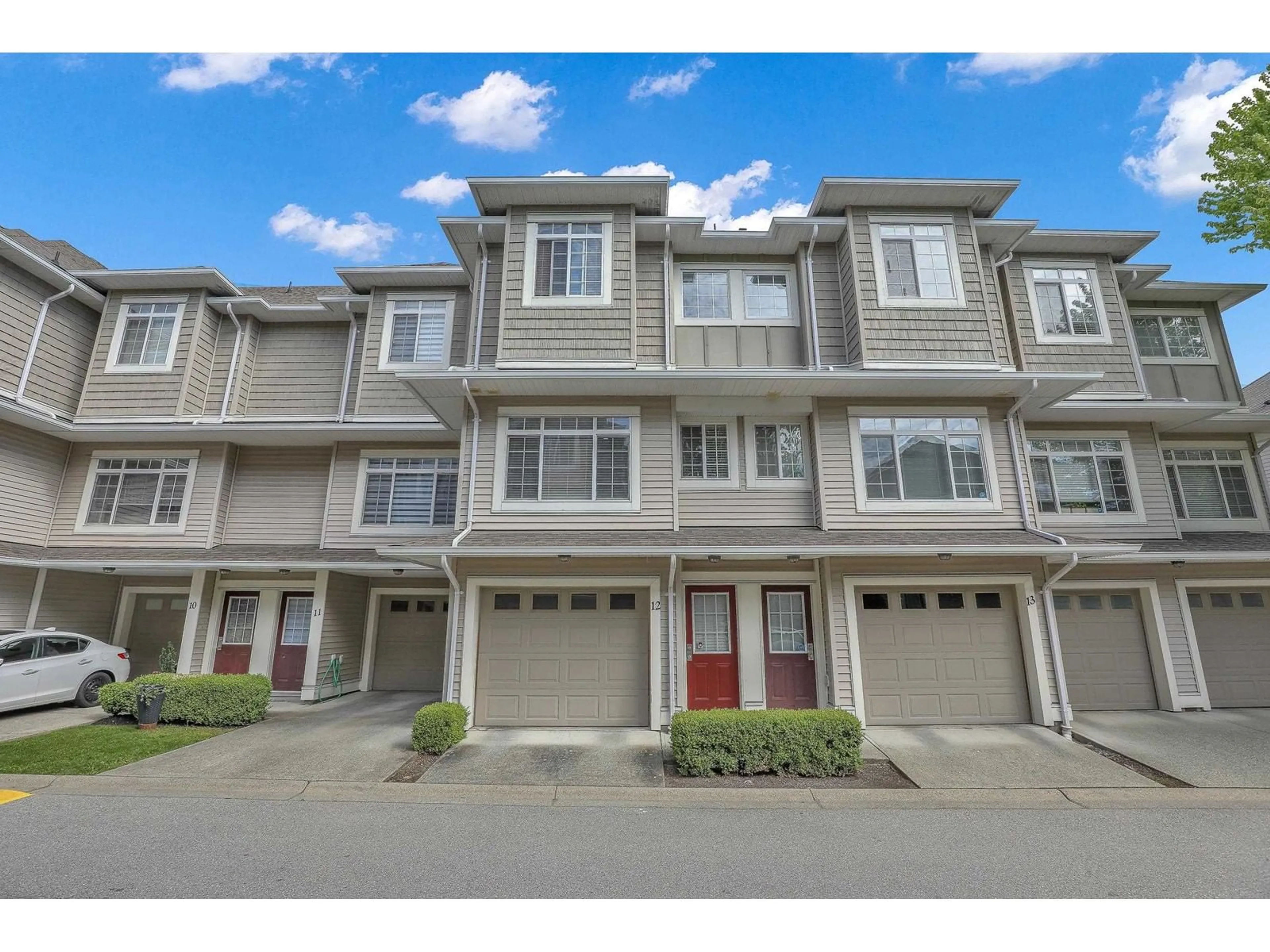 A pic from outside/outdoor area/front of a property/back of a property/a pic from drone, street for 12 - 6852 193, Surrey British Columbia V4N0C8