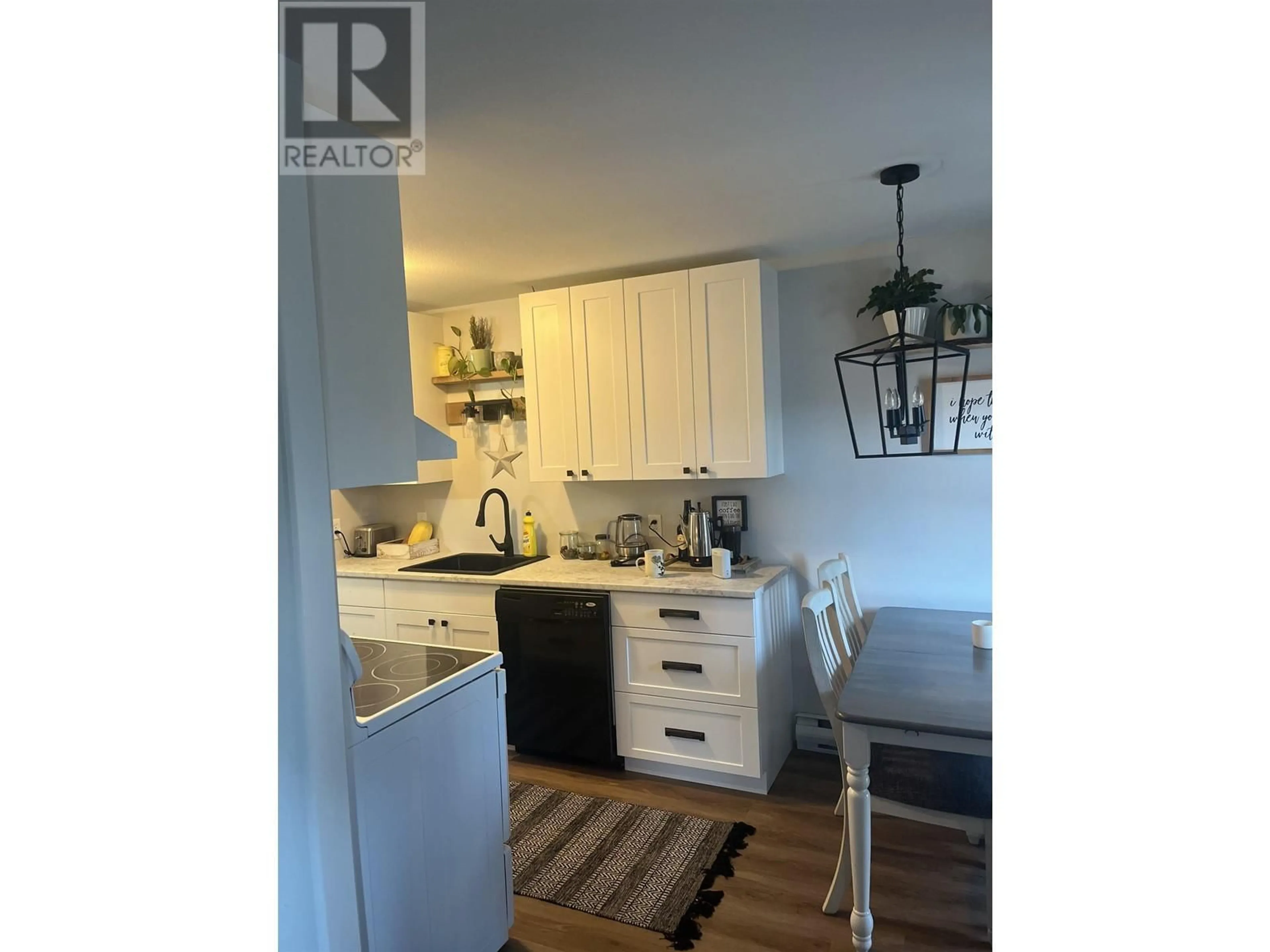 Open concept kitchen, wood/laminate floor for 4739 WALSH AVENUE, Terrace British Columbia V8G1Y7