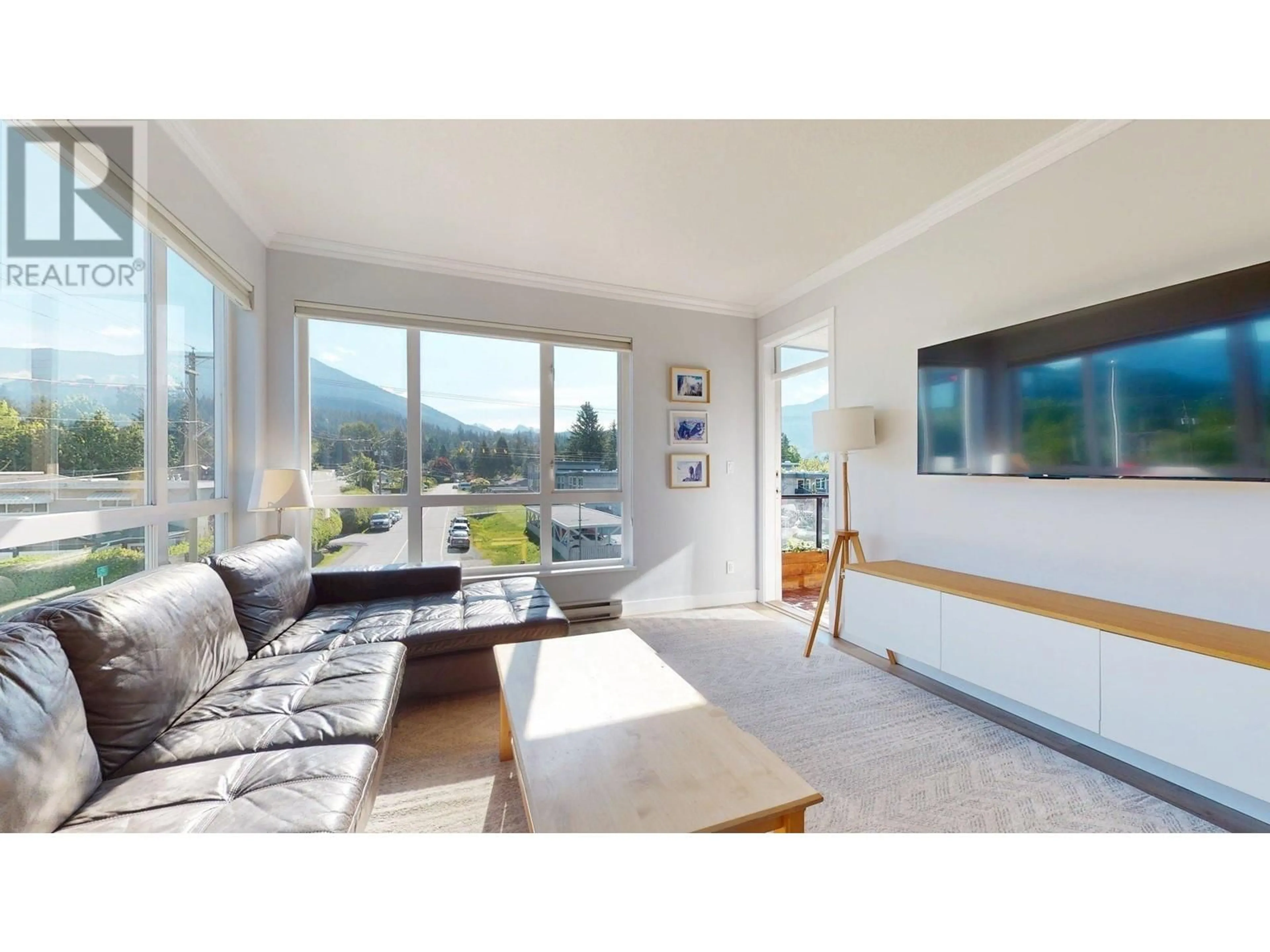 Living room with furniture, unknown for 216 - 40437 TANTALUS ROAD, Squamish British Columbia V0N1T0