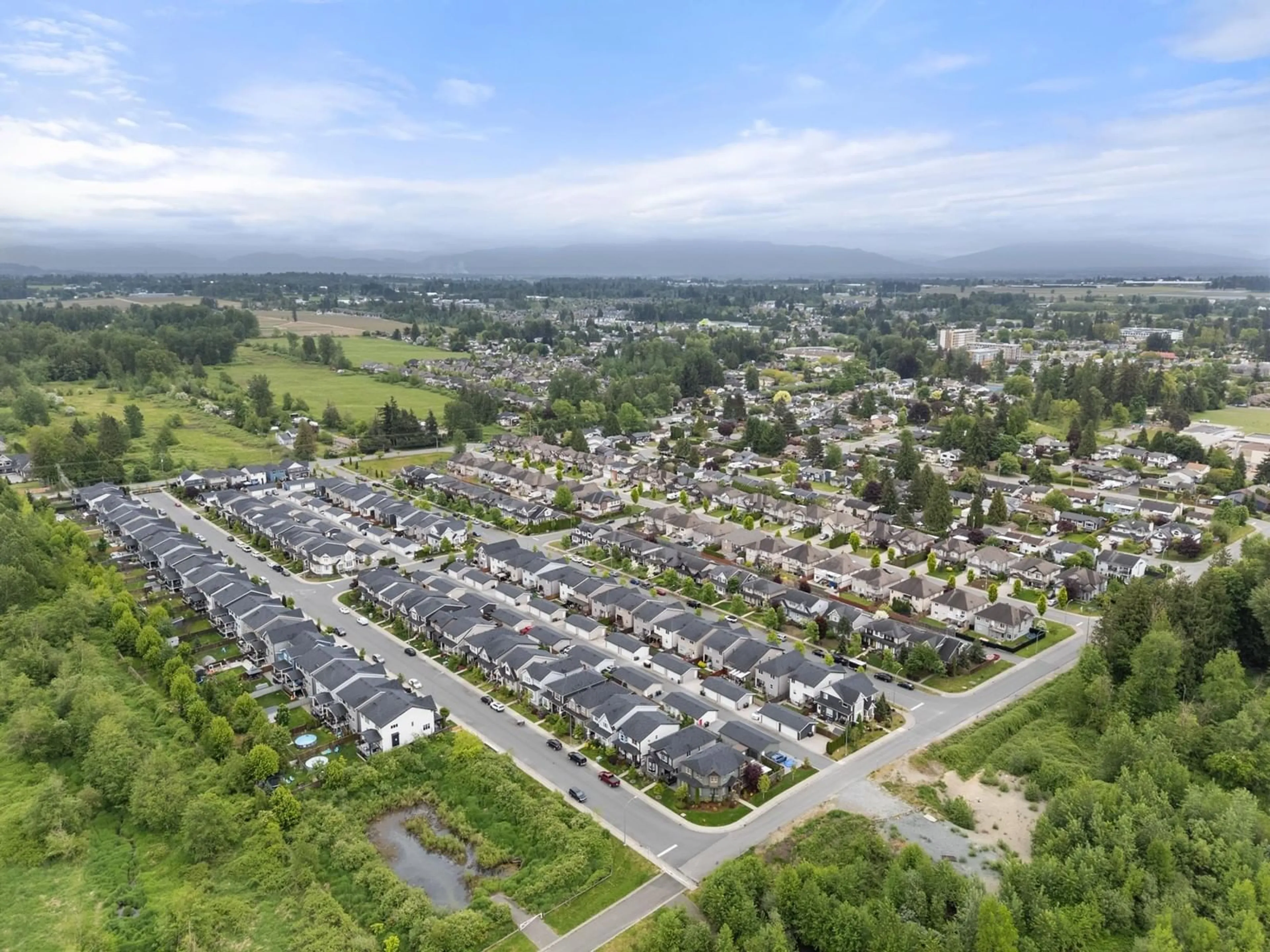 A pic from outside/outdoor area/front of a property/back of a property/a pic from drone, mountain view for 27055 35A, Langley British Columbia V4W0C3