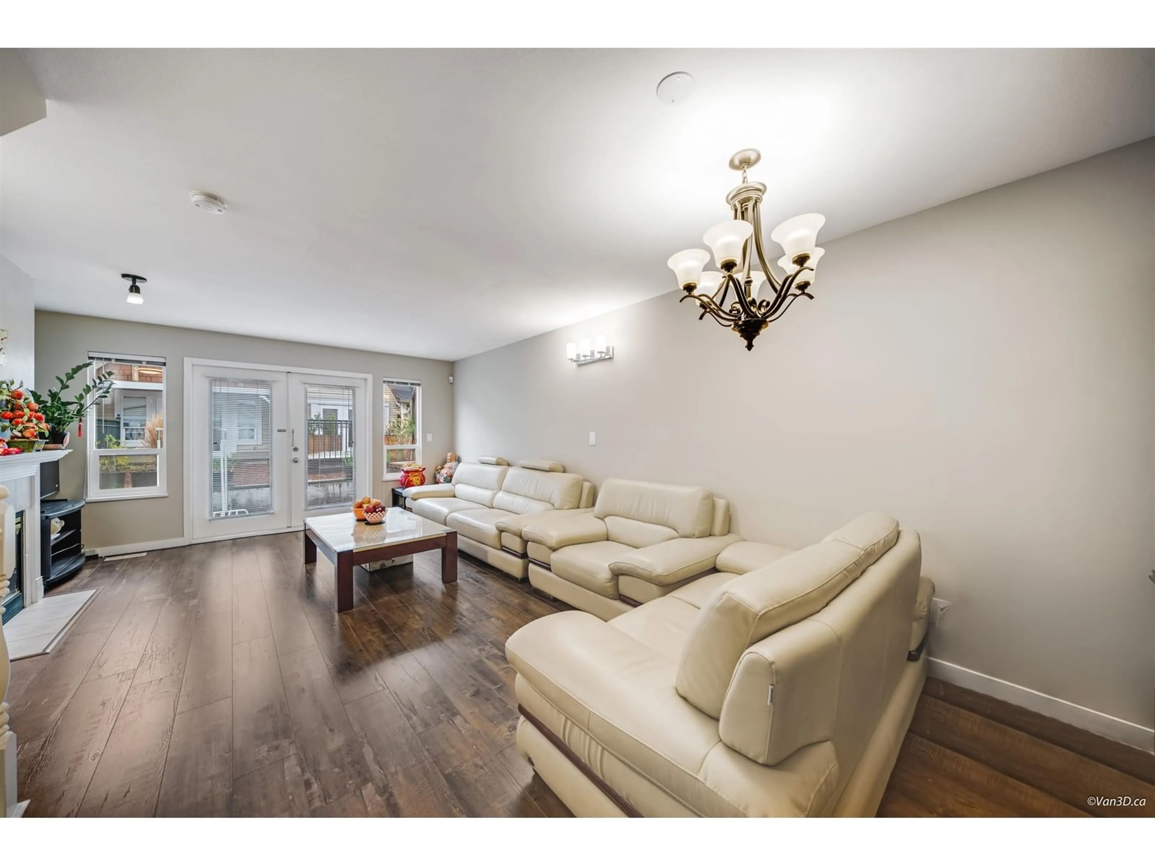 Living room with furniture, wood/laminate floor for 34 - 15488 101A, Surrey British Columbia V3R0Z8