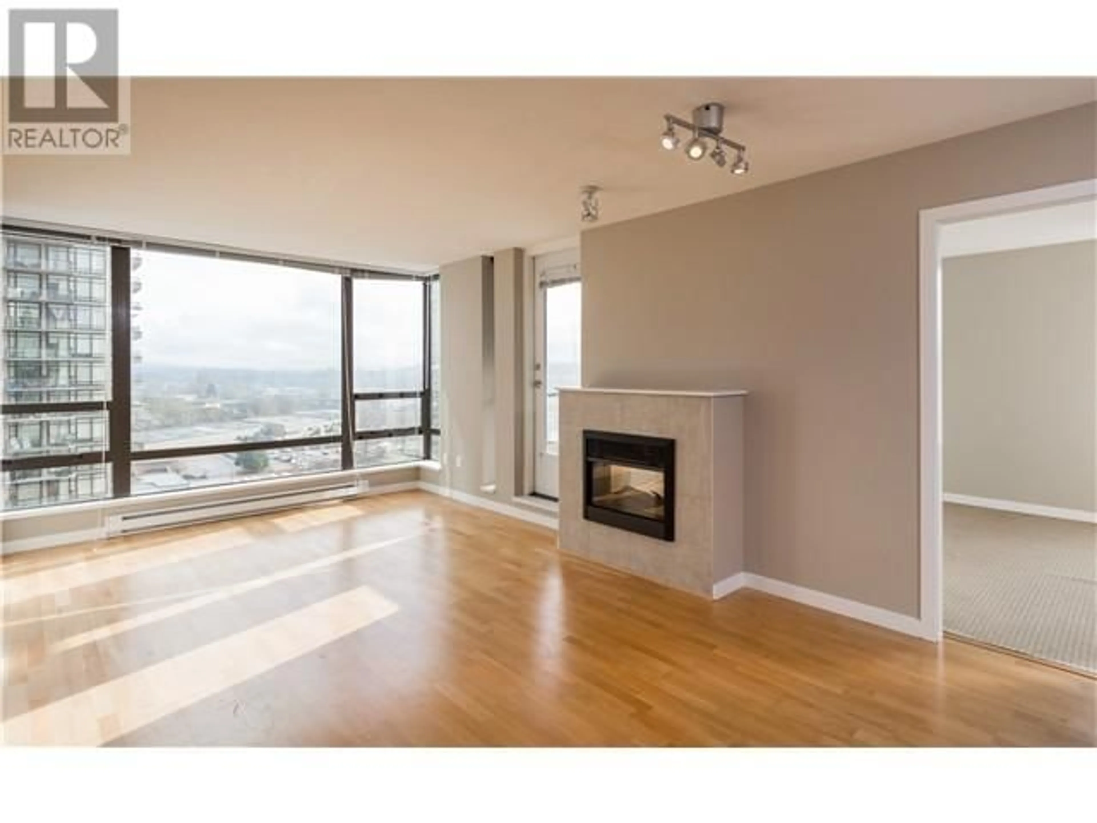 Living room with furniture, wood/laminate floor for 1602 - 4182 DAWSON STREET, Burnaby British Columbia V5C0A2