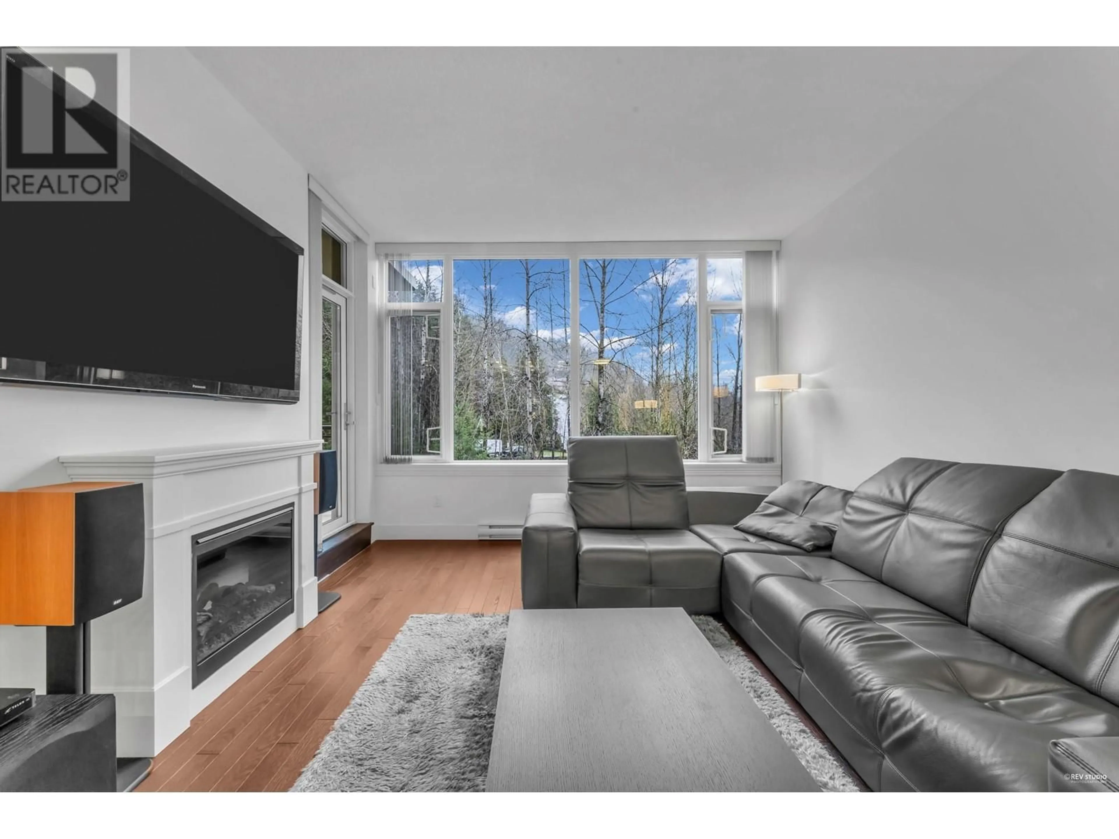 Living room with furniture, wood/laminate floor for 707 - 1415 PARKWAY BOULEVARD, Coquitlam British Columbia V3E0C7