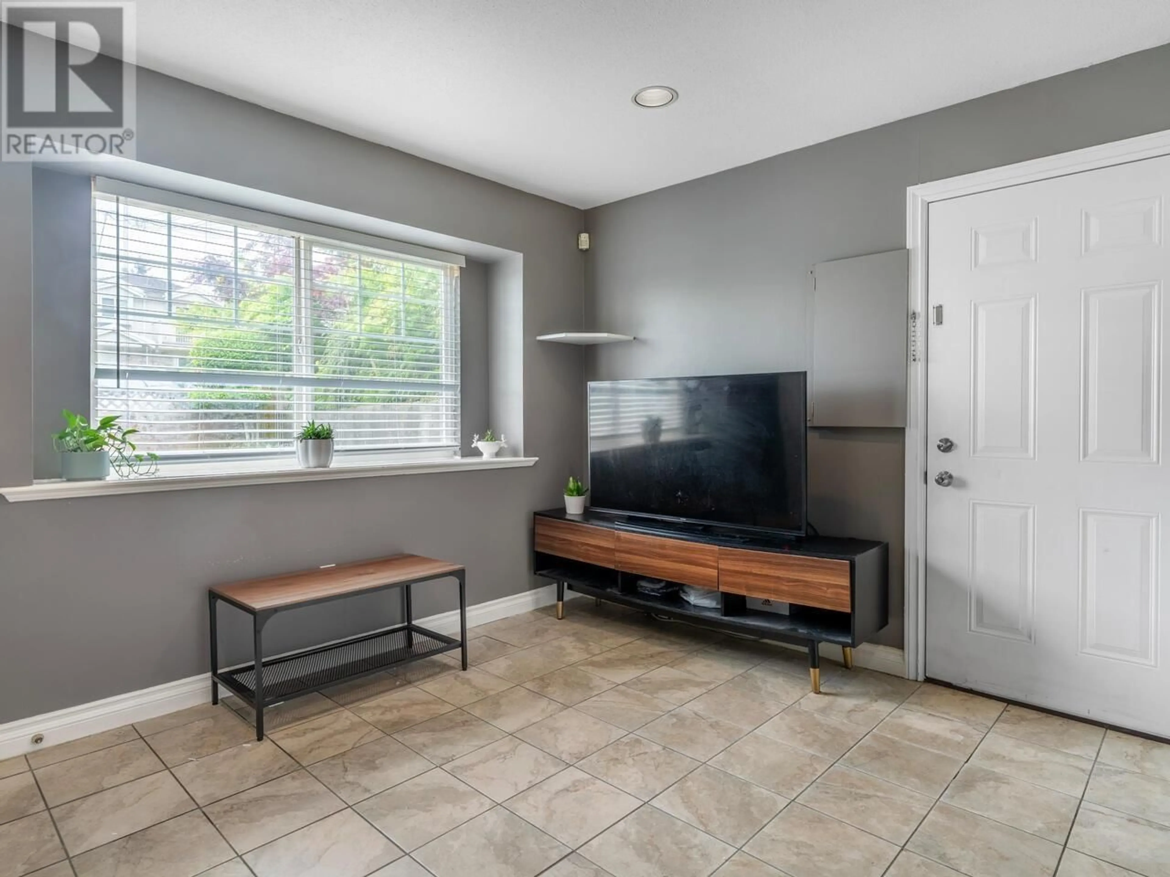 Living room with furniture, ceramic/tile floor for 5983 HARDWICK STREET, Burnaby British Columbia V5G1R5
