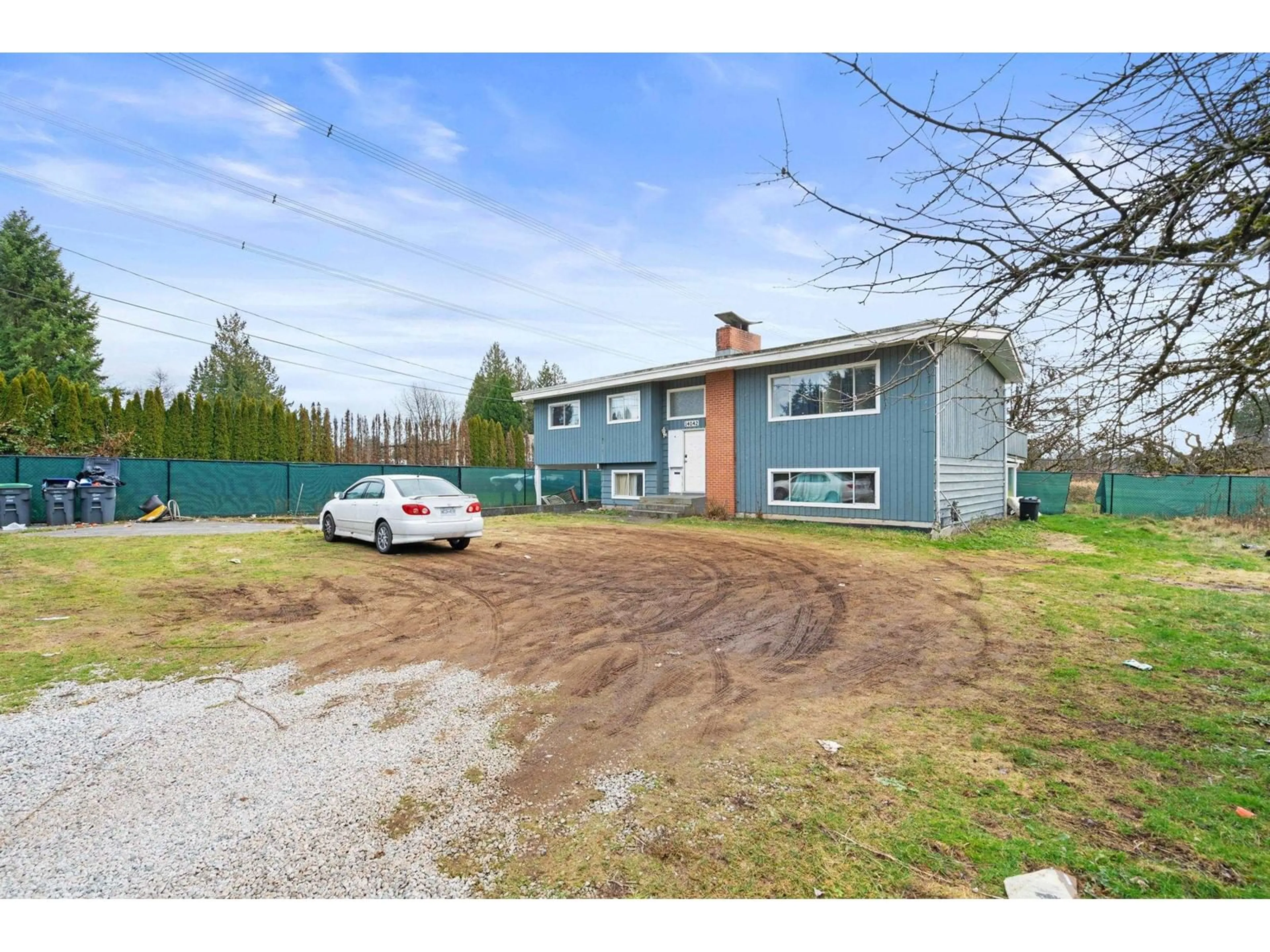 A pic from outside/outdoor area/front of a property/back of a property/a pic from drone, street for 14042 110, Surrey British Columbia V3R1Z2