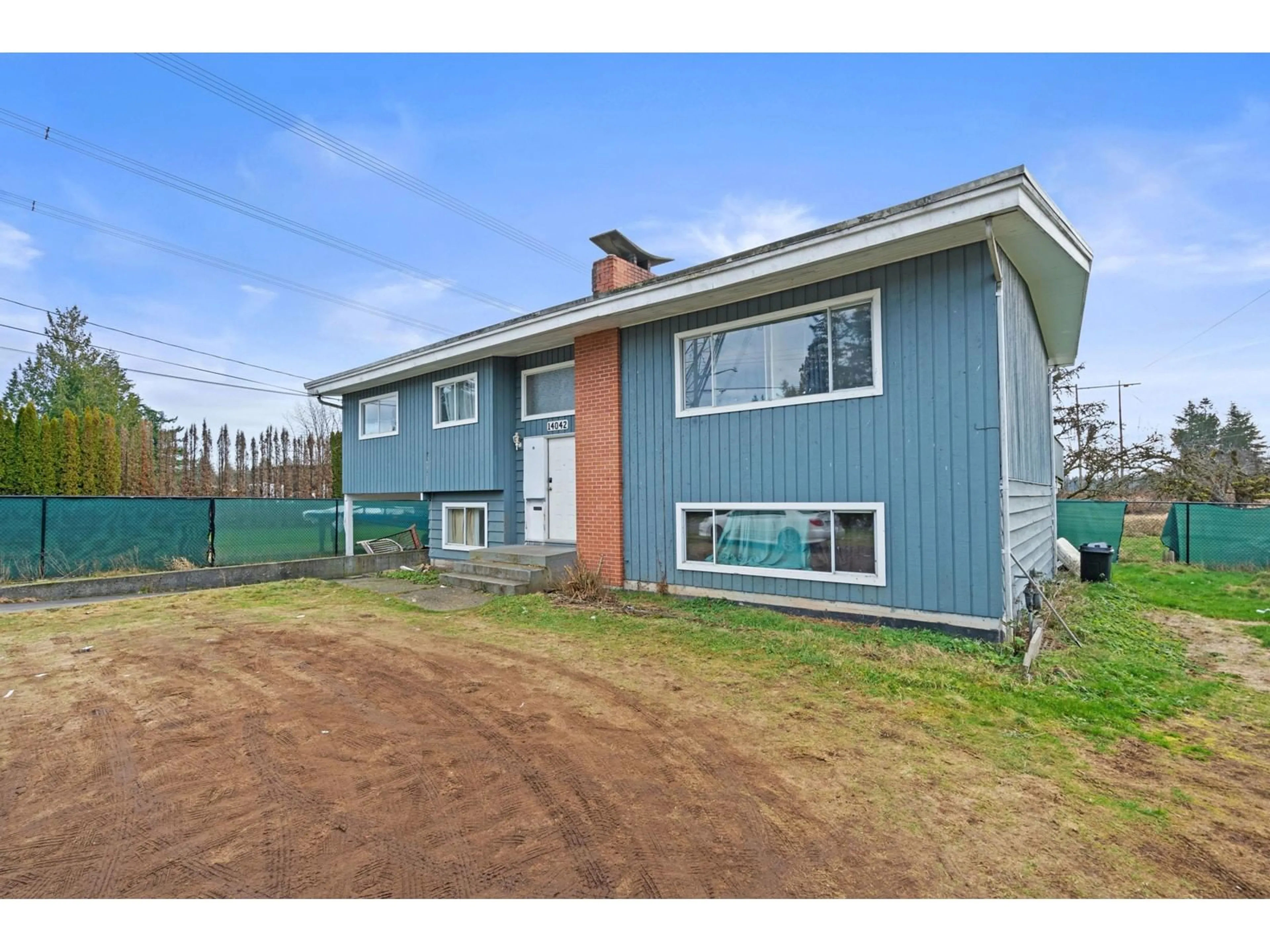 A pic from outside/outdoor area/front of a property/back of a property/a pic from drone, building for 14042 110, Surrey British Columbia V3R1Z2