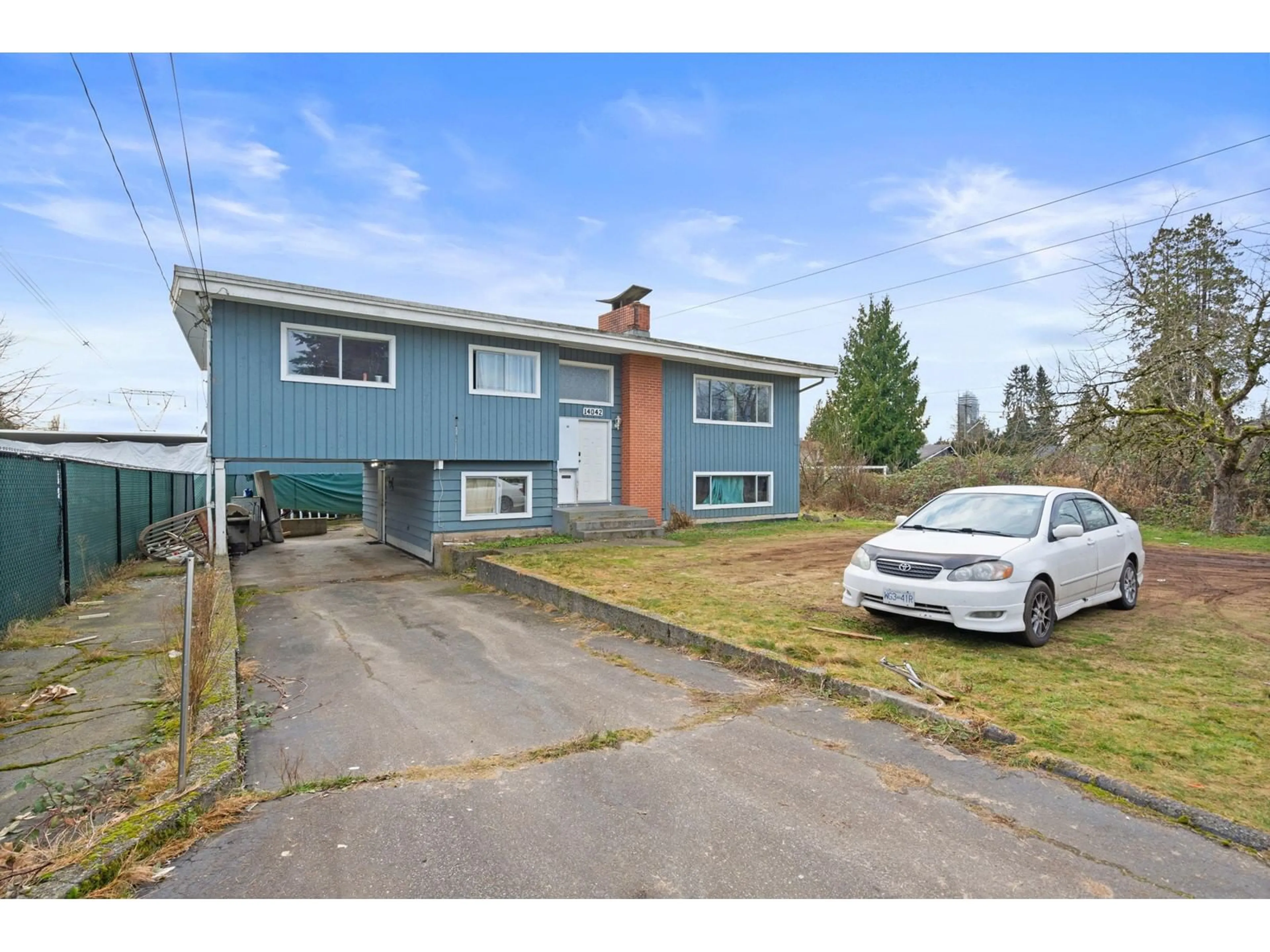 A pic from outside/outdoor area/front of a property/back of a property/a pic from drone, street for 14042 110, Surrey British Columbia V3R1Z2