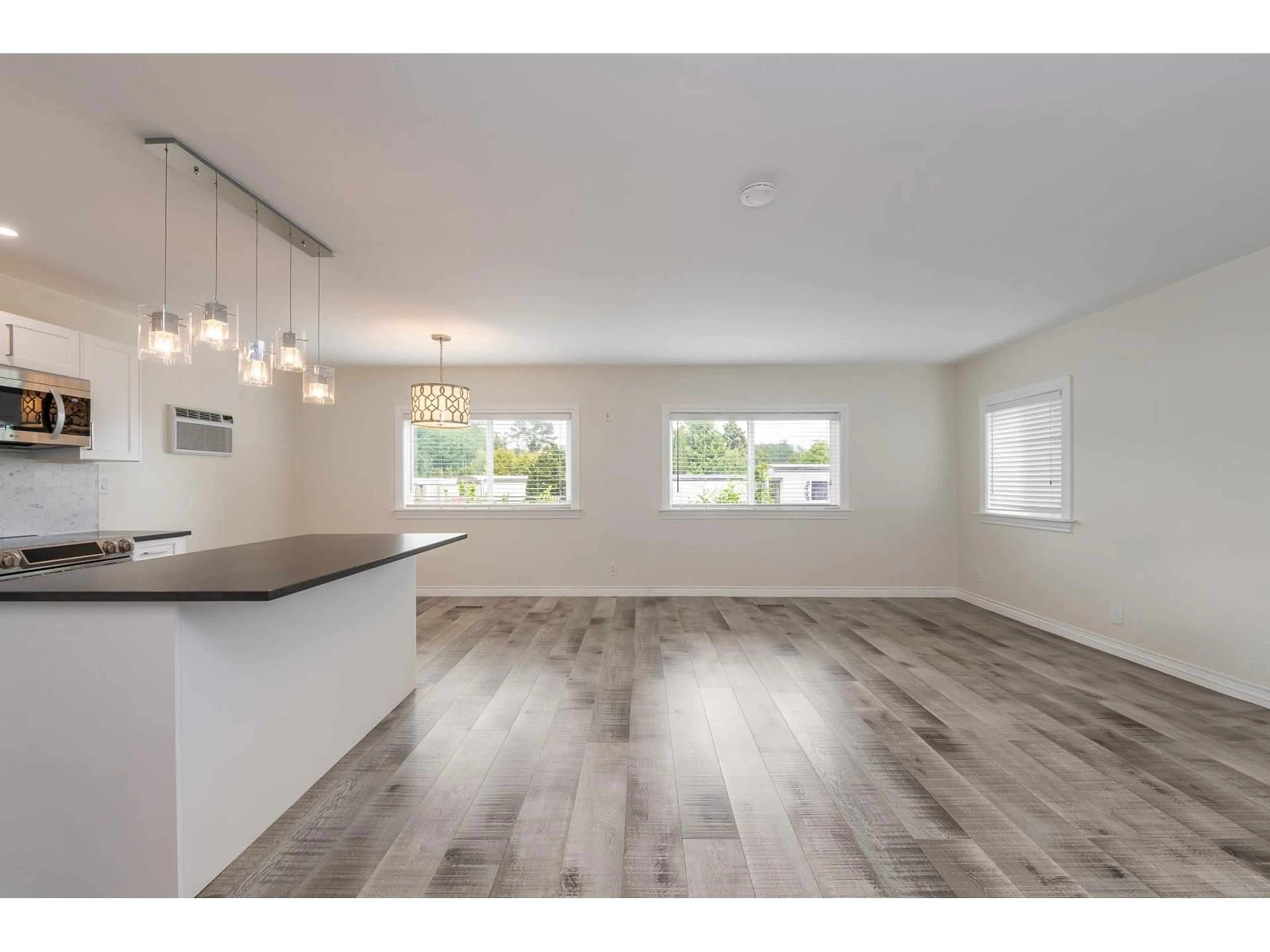 Open concept kitchen, wood/laminate floor for 157 - 1840 160, Surrey British Columbia V4A4X4