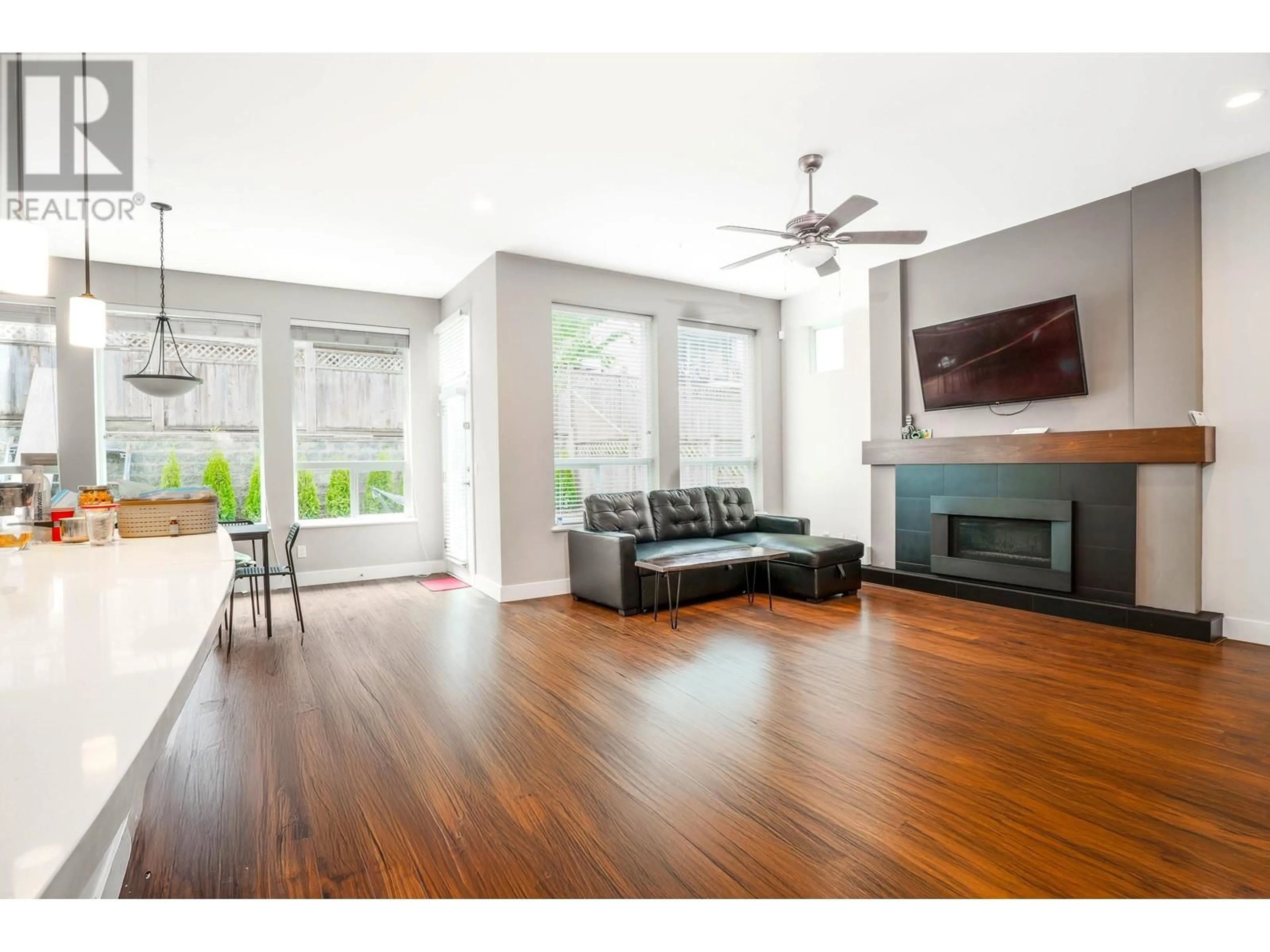 Living room with furniture, wood/laminate floor for 10480 ROBERTSON STREET, Maple Ridge British Columbia V2W0H8