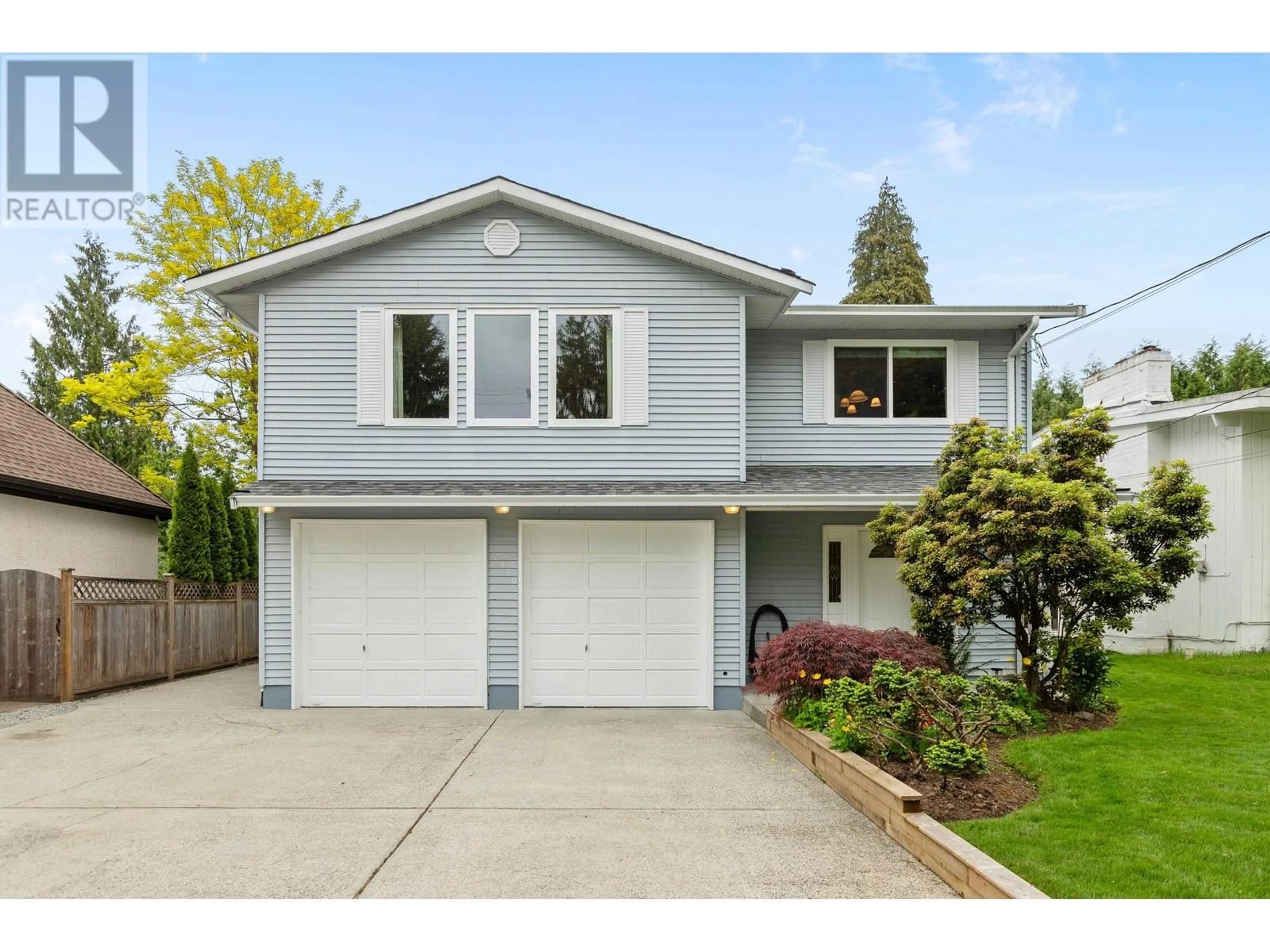 Home with vinyl exterior material, street for 12440 208 STREET, Maple Ridge British Columbia V2X4X2