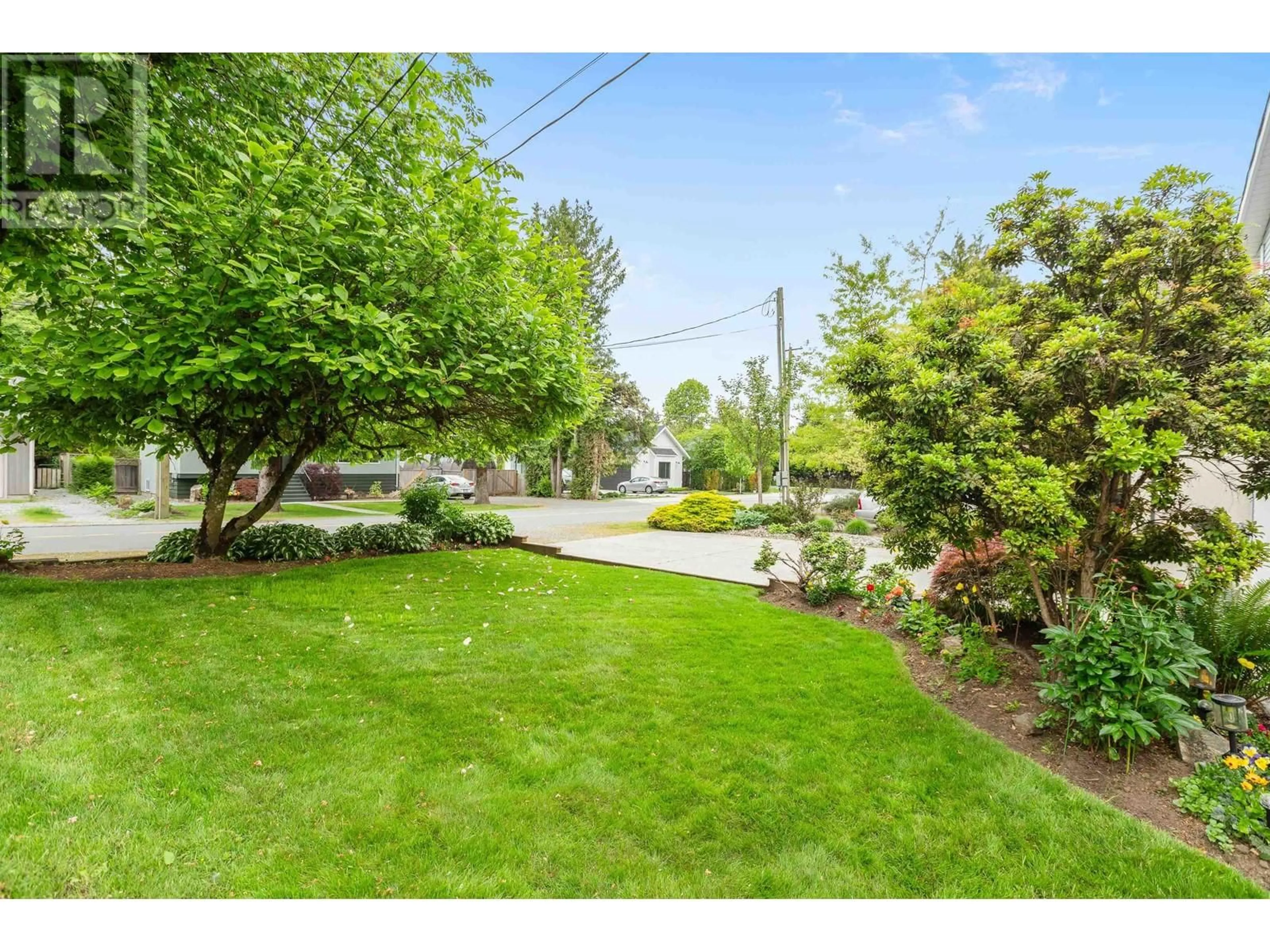 A pic from outside/outdoor area/front of a property/back of a property/a pic from drone, street for 12440 208 STREET, Maple Ridge British Columbia V2X4X2
