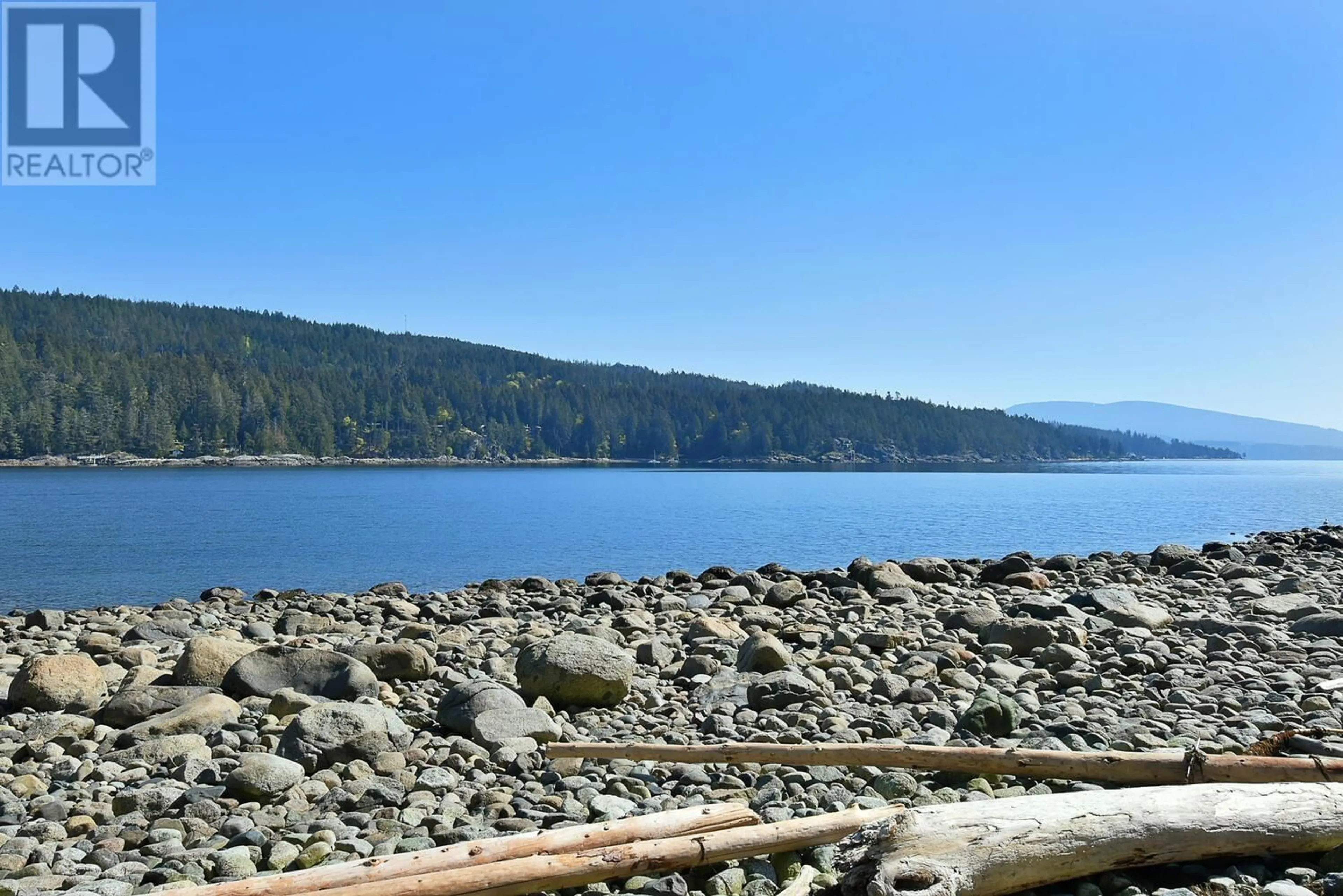 Patio, water/lake/river/ocean view for 7638 EUREKA AVENUE, Halfmoon Bay British Columbia V7Z1A1