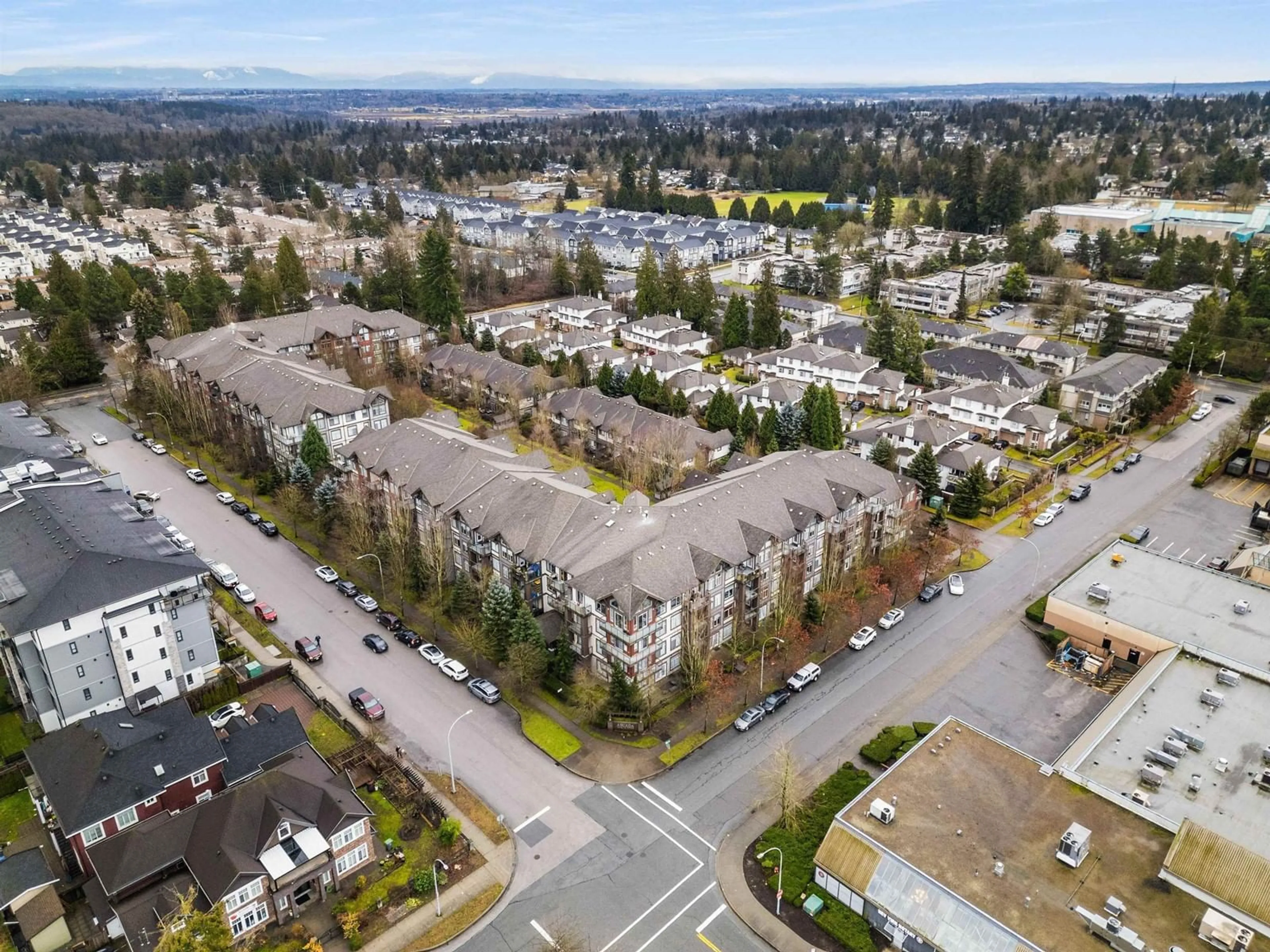 A pic from outside/outdoor area/front of a property/back of a property/a pic from drone, unknown for 413 - 15322 101, Surrey British Columbia V3R4G9