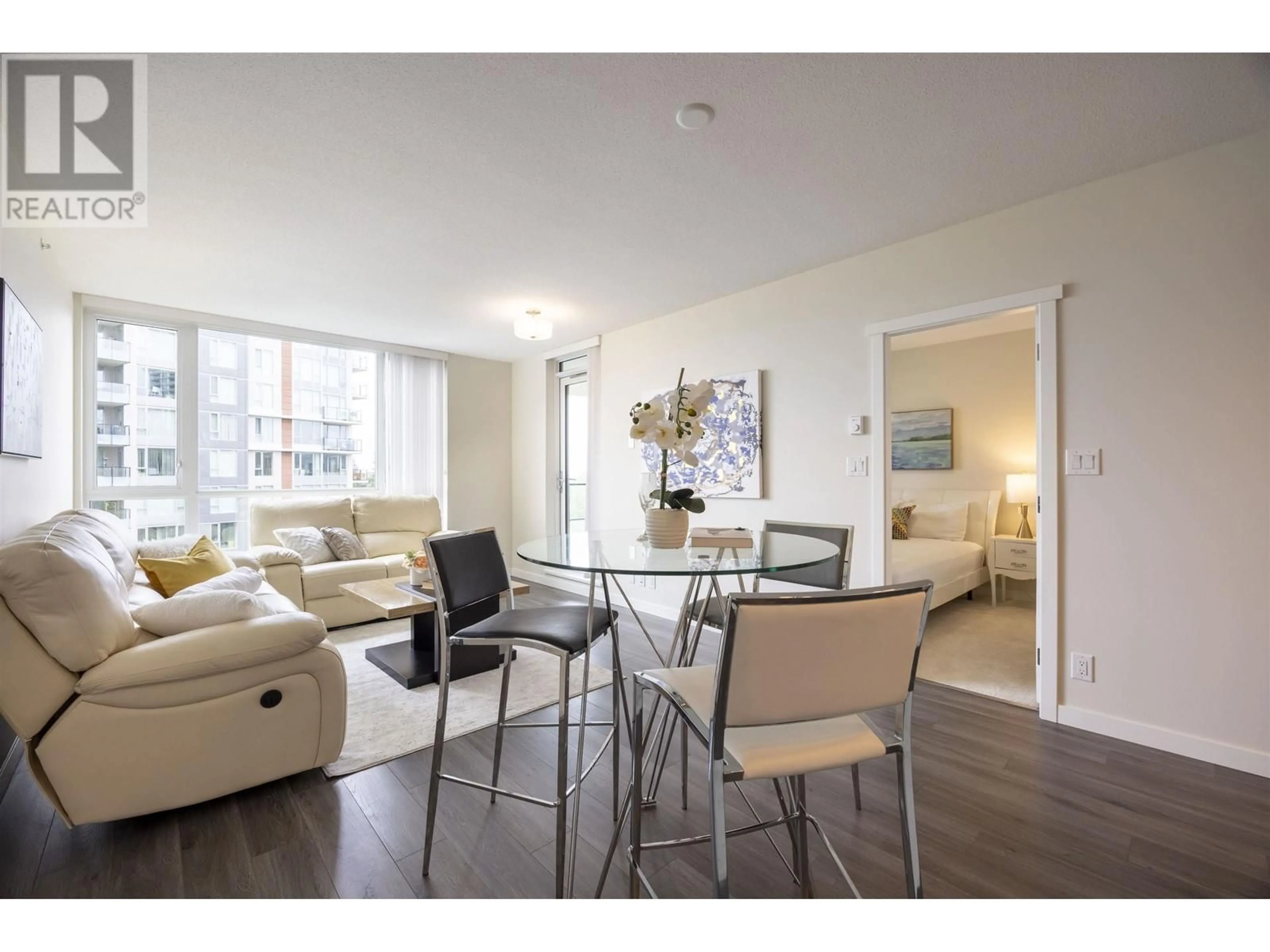 Living room with furniture, wood/laminate floor for 1002 - 3096 WINDSOR GATE, Coquitlam British Columbia V3B0P4