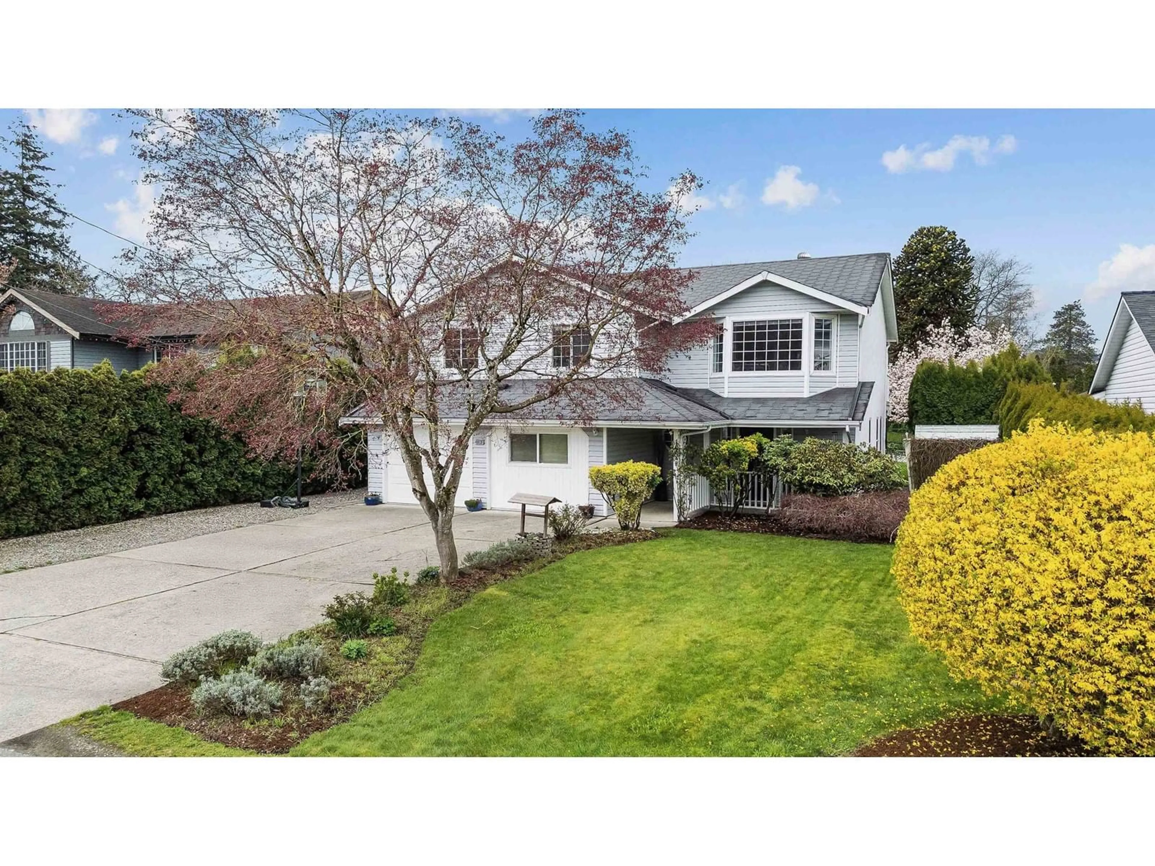 Home with vinyl exterior material, street for 46039 HIGGINSON ROAD, Sardis British Columbia V2R2A9