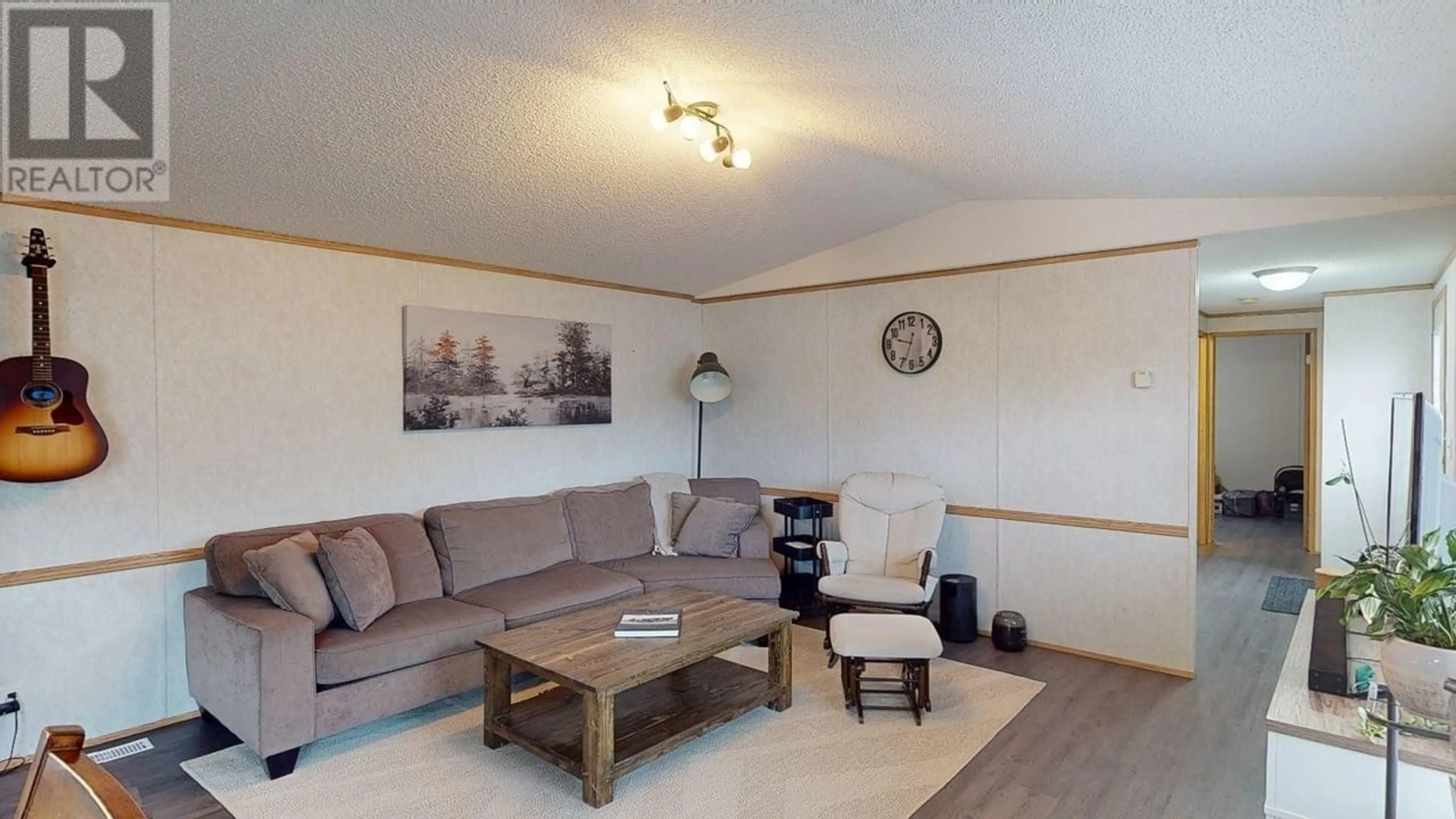 Living room with furniture, wood/laminate floor for 10479 98 STREET, Taylor British Columbia V0C2K0