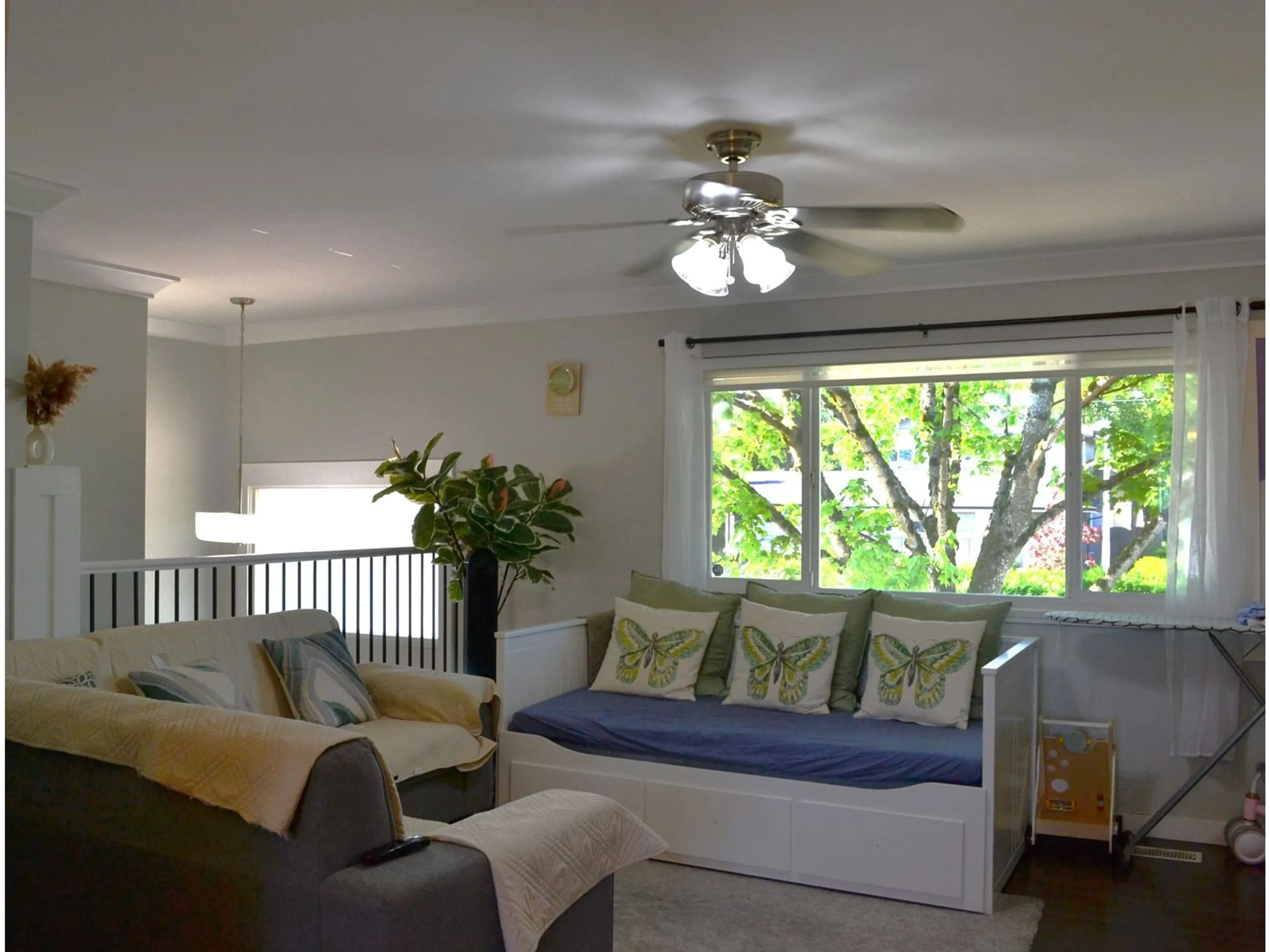 Living room with furniture, wood/laminate floor for 17486 61A, Surrey British Columbia V3S5K2