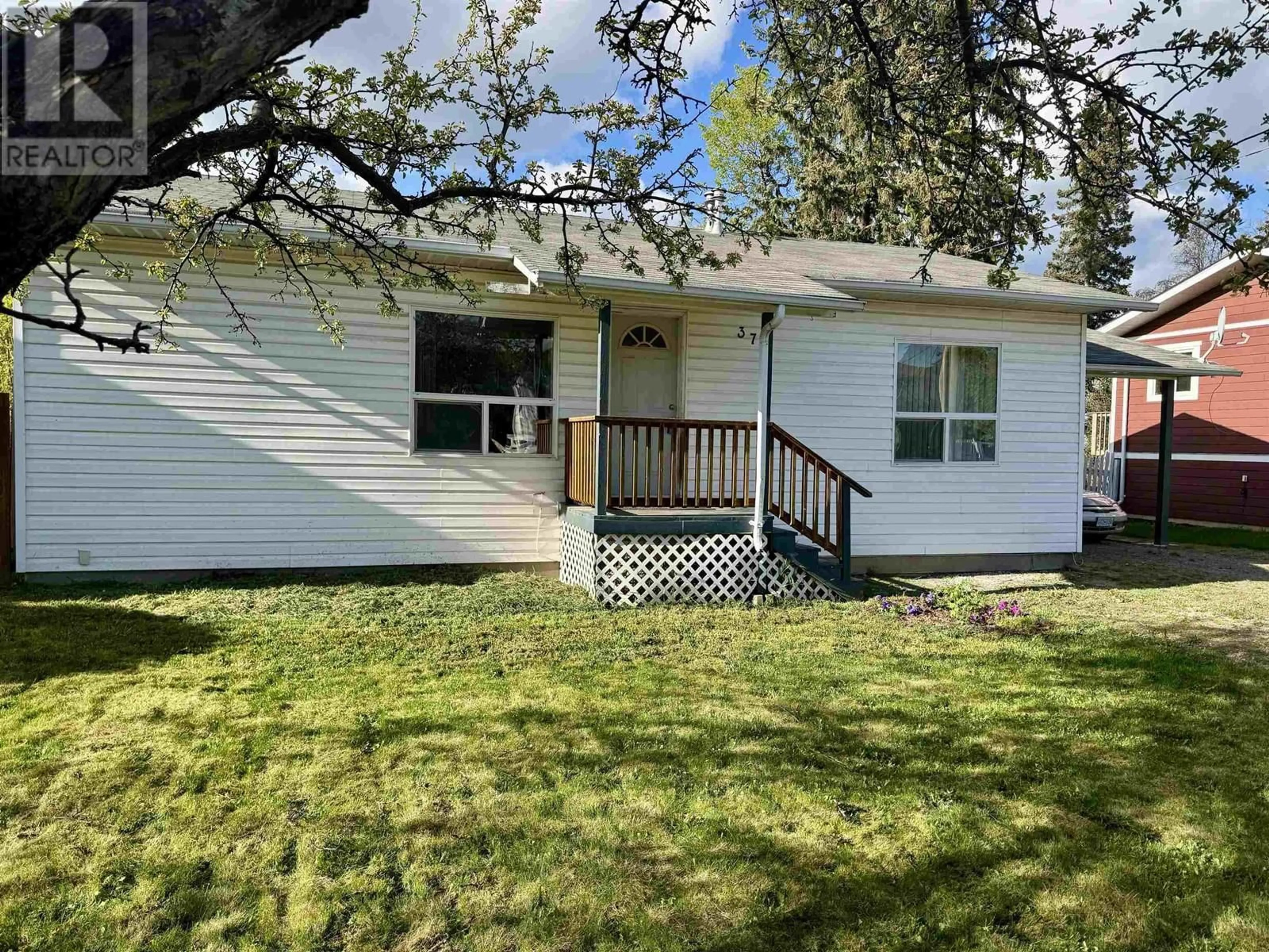 Home with vinyl exterior material, street for 377 2ND STREET, Vanderhoof British Columbia V0J3A0