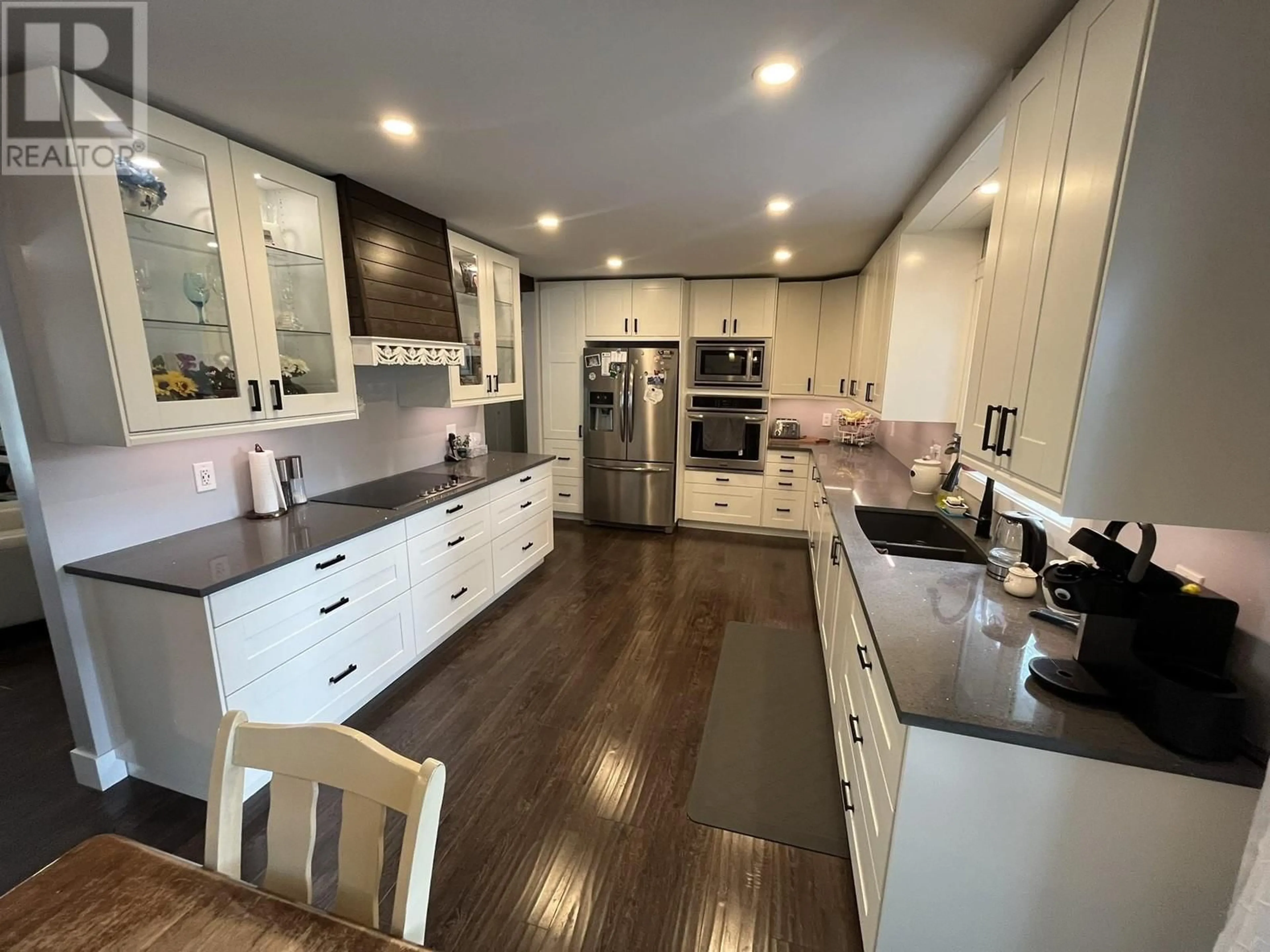 Open concept kitchen, wood/laminate floor for 2863 KILLARNEY DRIVE, Prince George British Columbia V2K3J5