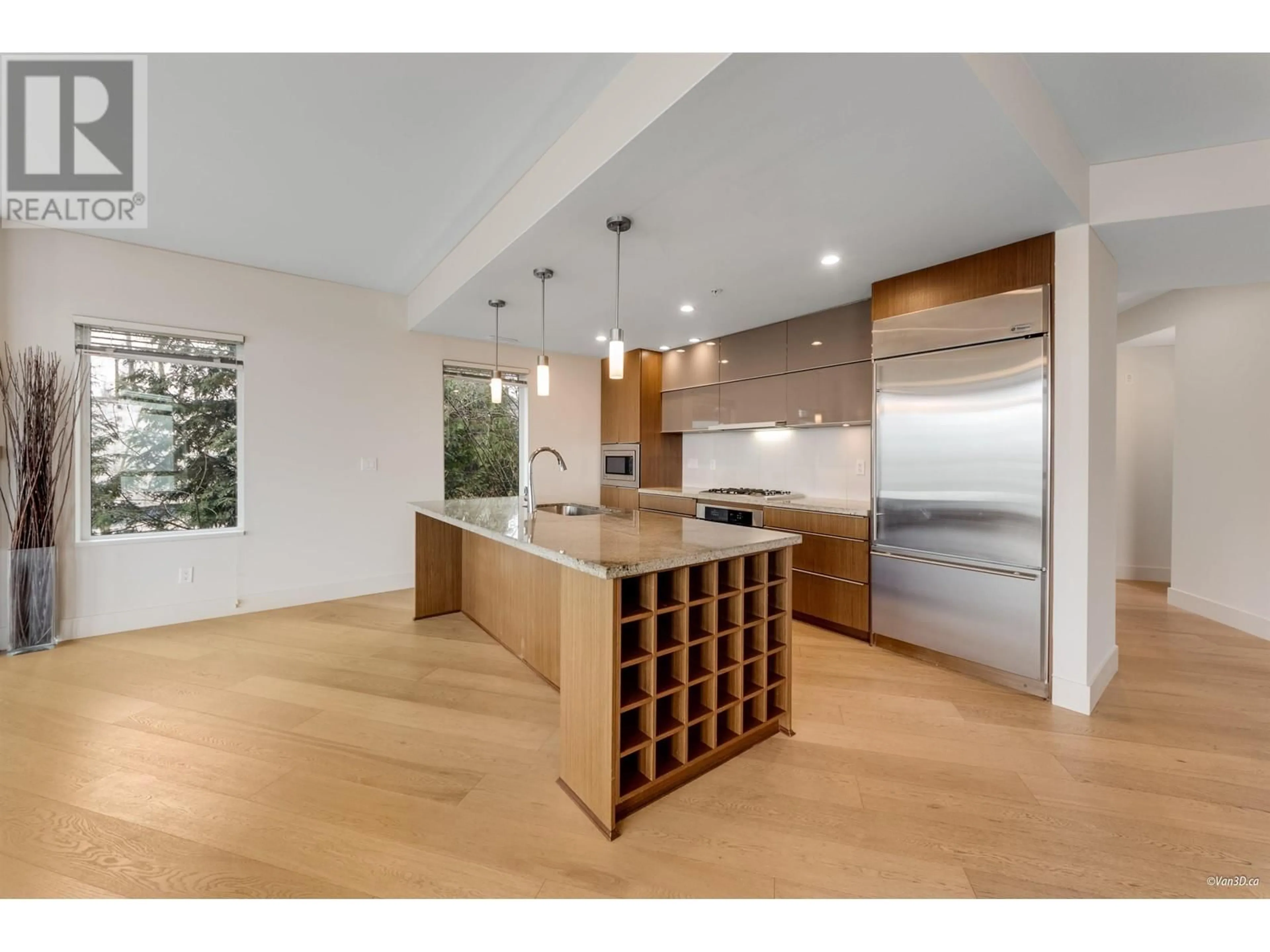 Open concept kitchen, wood/laminate floor for 2995 WALL STREET, Vancouver British Columbia V5K0A6