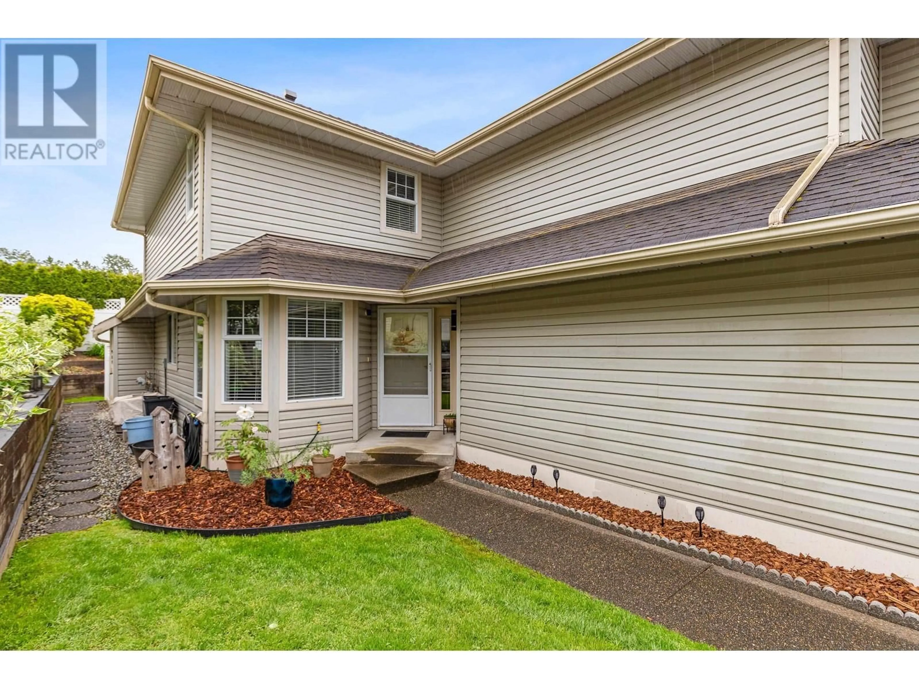 Home with vinyl exterior material, street for 10 - 22538 116 AVENUE, Maple Ridge British Columbia V2X0Z8