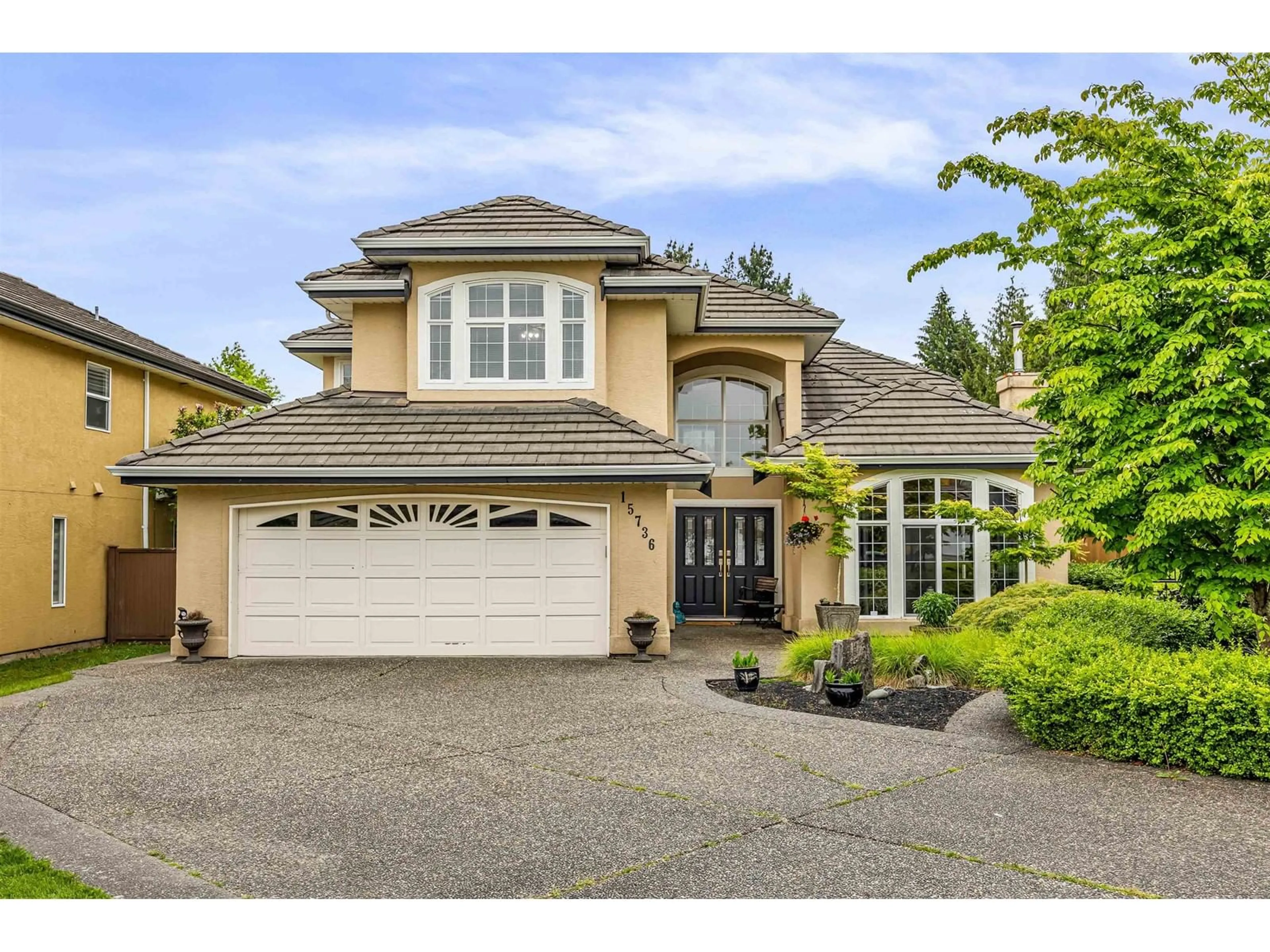 Home with vinyl exterior material, street for 15736 108A, Surrey British Columbia V4N4T4