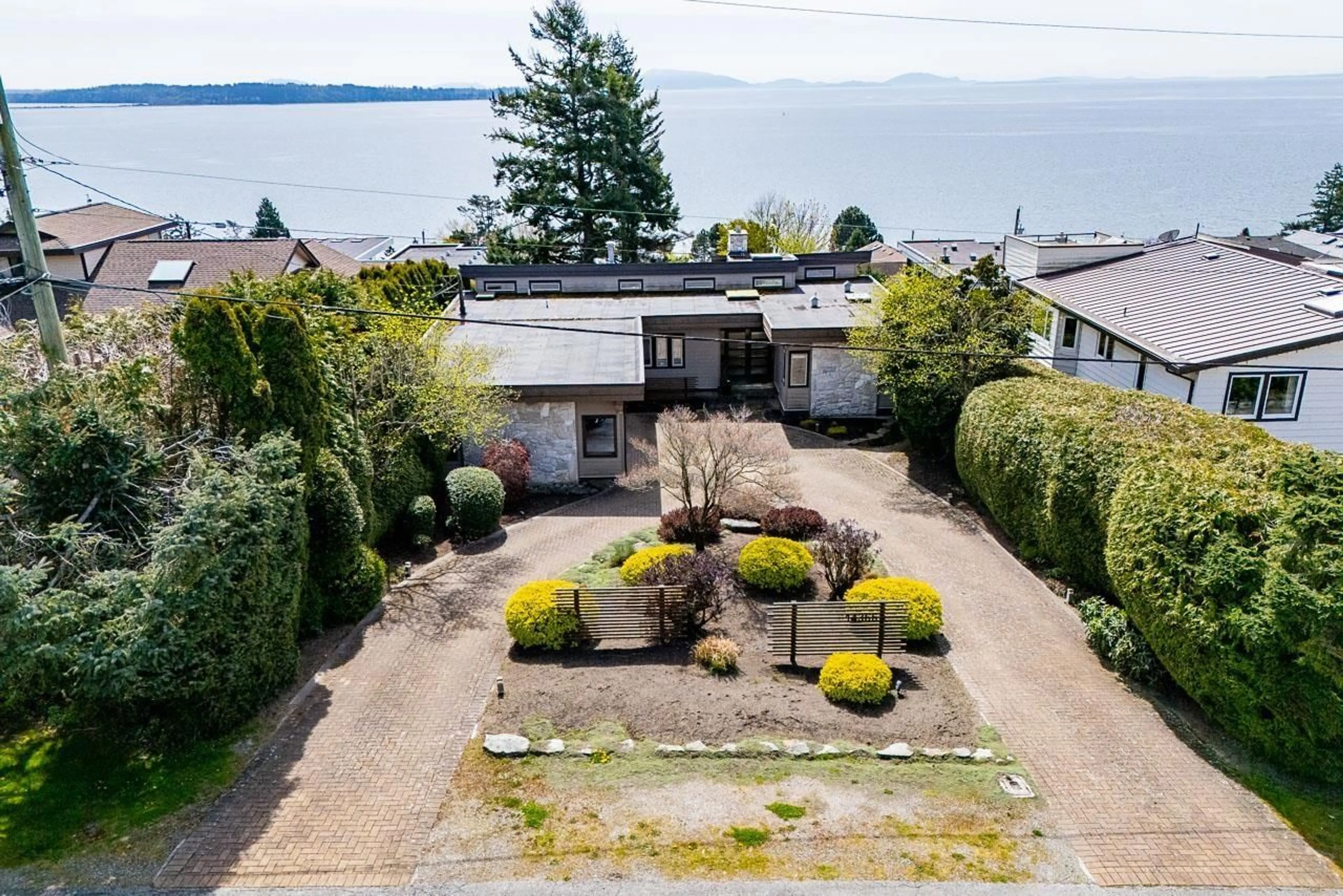 A pic from outside/outdoor area/front of a property/back of a property/a pic from drone, water/lake/river/ocean view for 14366 MAGDALEN, White Rock British Columbia V4B2X3