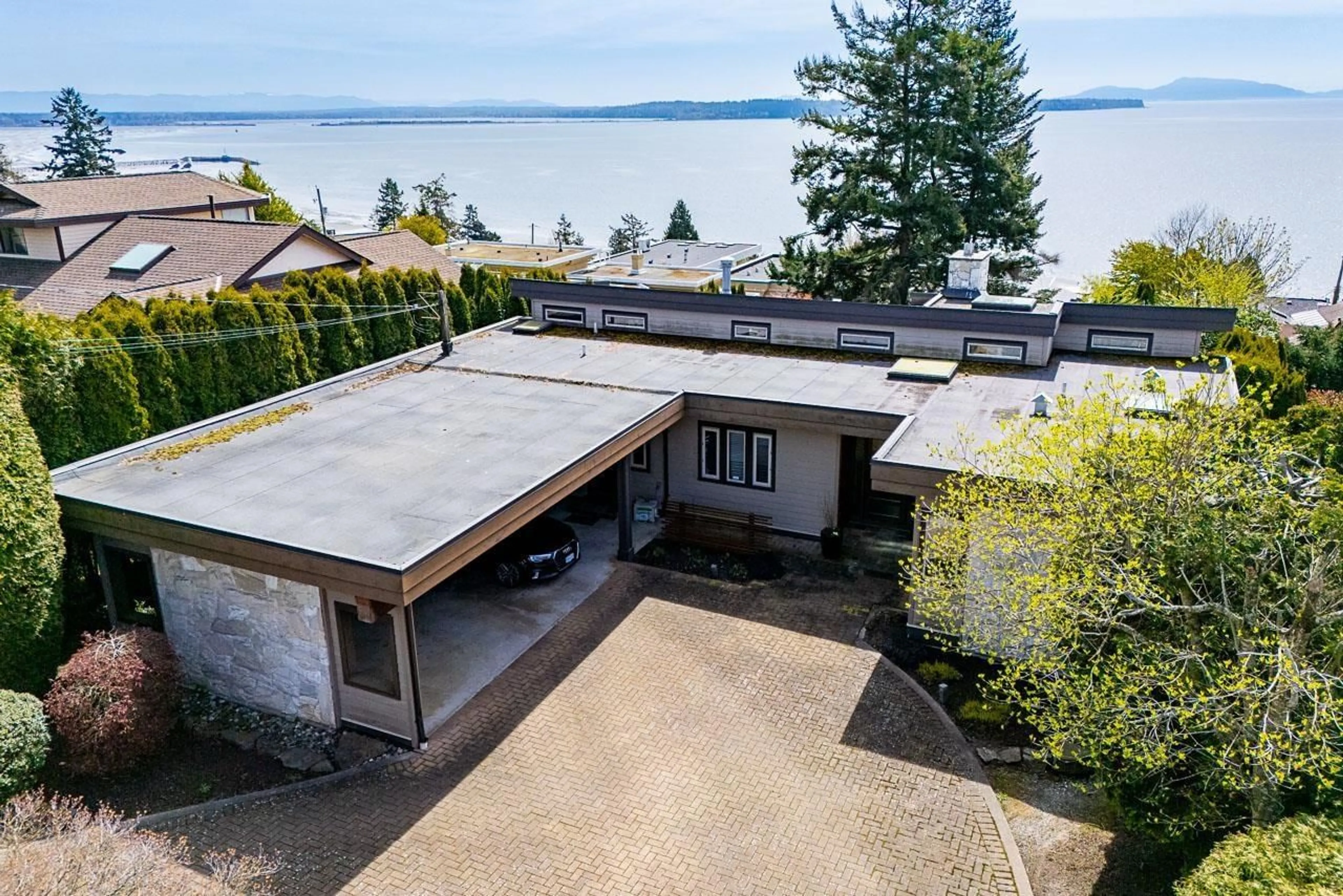 A pic from outside/outdoor area/front of a property/back of a property/a pic from drone, water/lake/river/ocean view for 14366 MAGDALEN, White Rock British Columbia V4B2X3