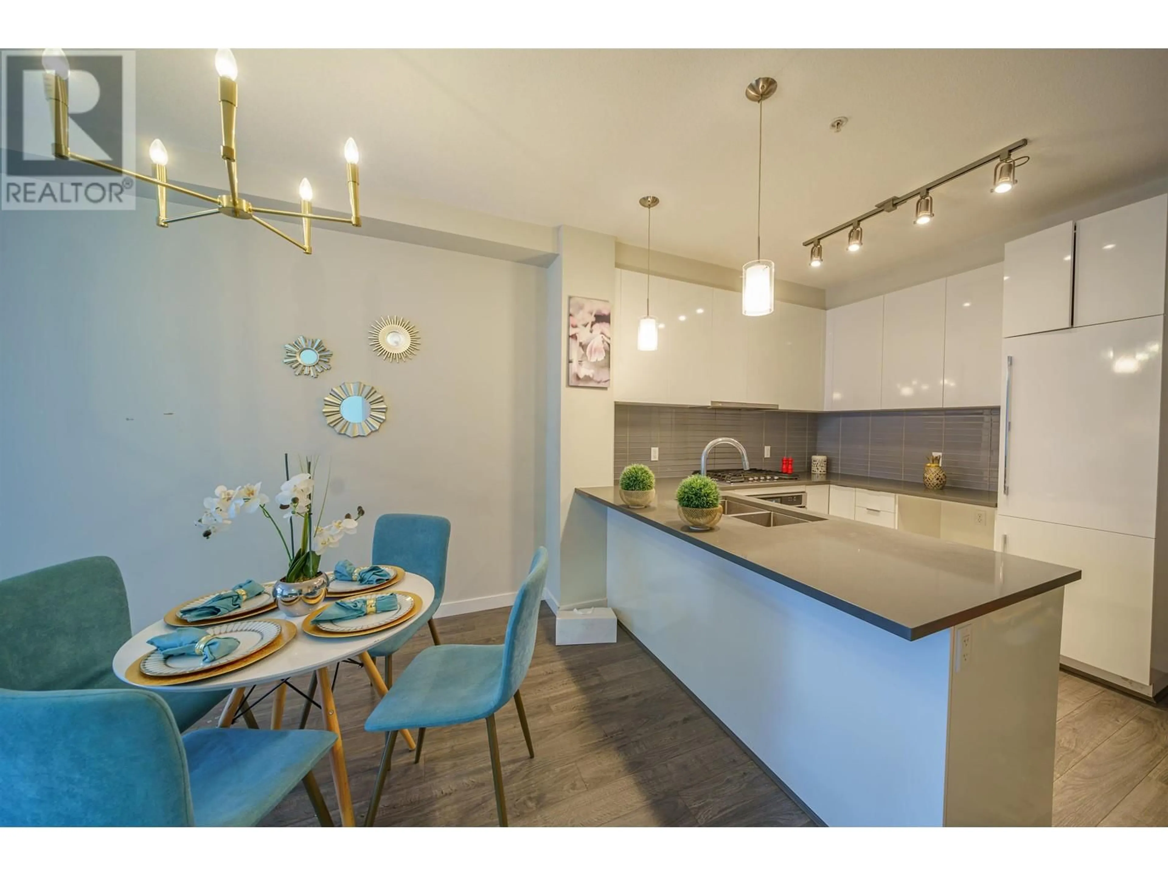 Open concept kitchen, wood/laminate floor for 209 - 9311 ALEXANDRA ROAD, Richmond British Columbia V6X2K5