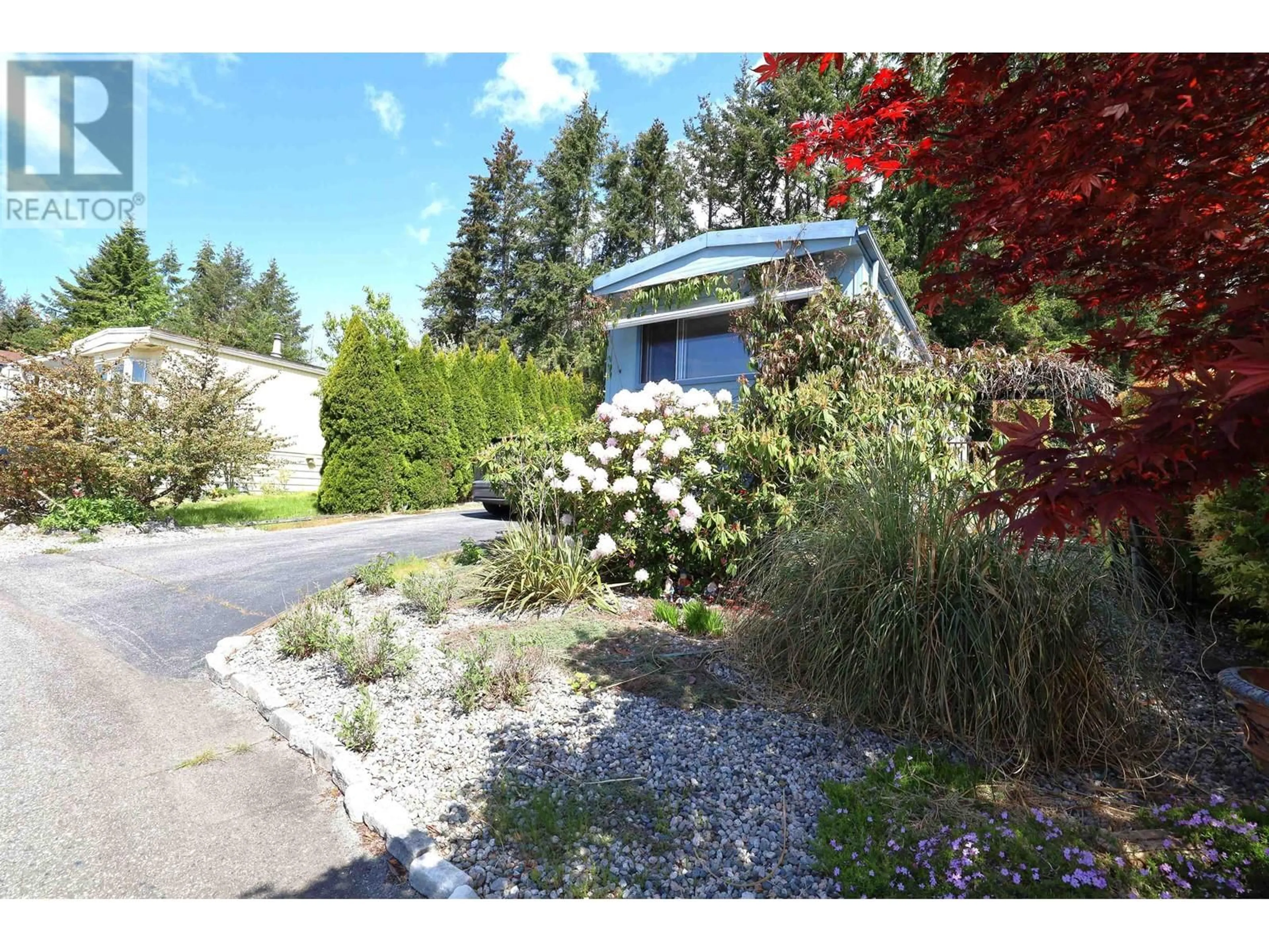 A pic from outside/outdoor area/front of a property/back of a property/a pic from drone, street for 24 - 4116 BROWNING ROAD, Sechelt British Columbia V7Z0A3