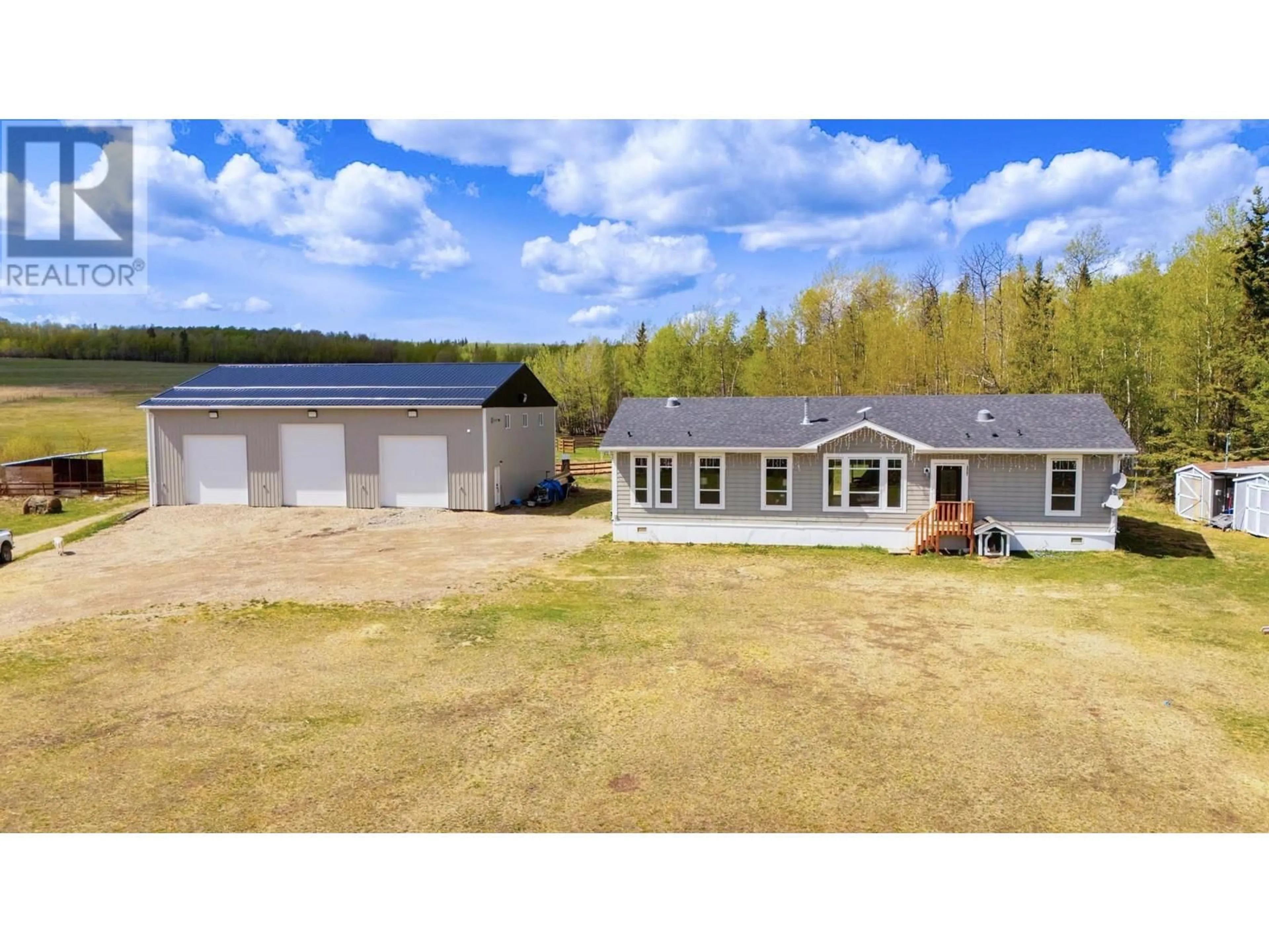 A pic from outside/outdoor area/front of a property/back of a property/a pic from drone, water/lake/river/ocean view for 13197 PRESTON STREET, Fort St. John British Columbia V0C1H0