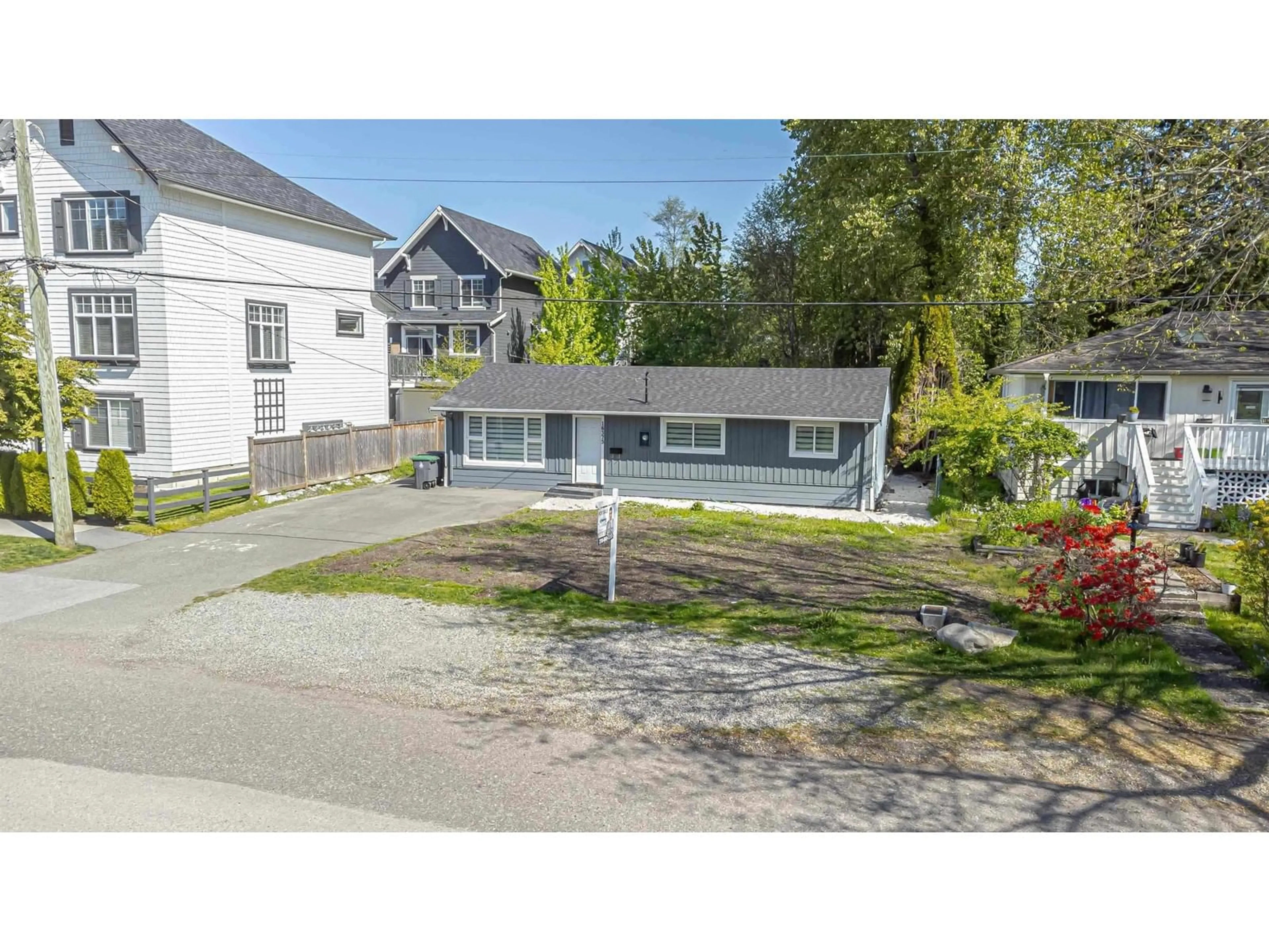 A pic from outside/outdoor area/front of a property/back of a property/a pic from drone, street for 16373 15, Surrey British Columbia V4A1L4