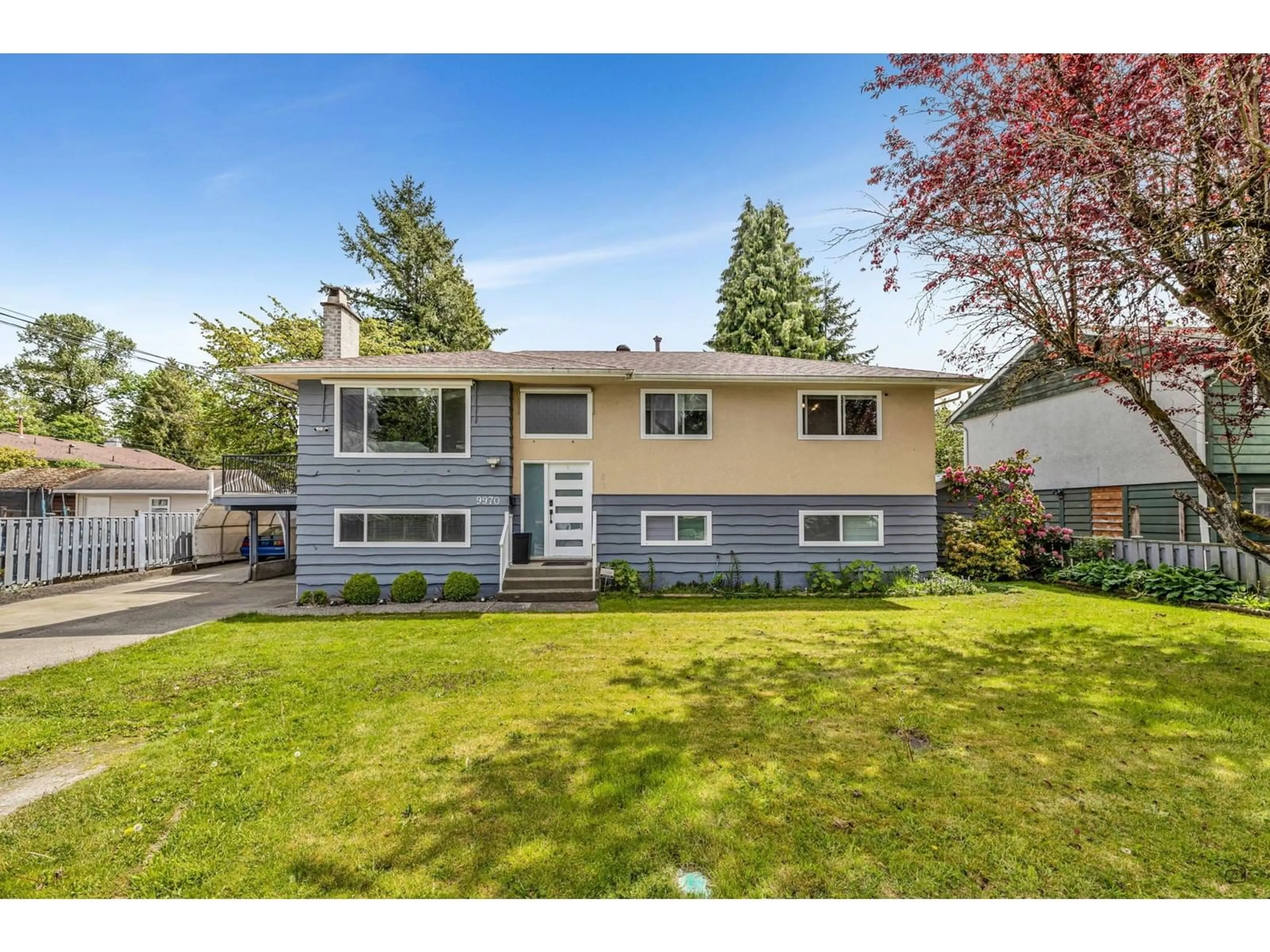 Home with vinyl exterior material, street for 9970 124A, Surrey British Columbia V3V3W5