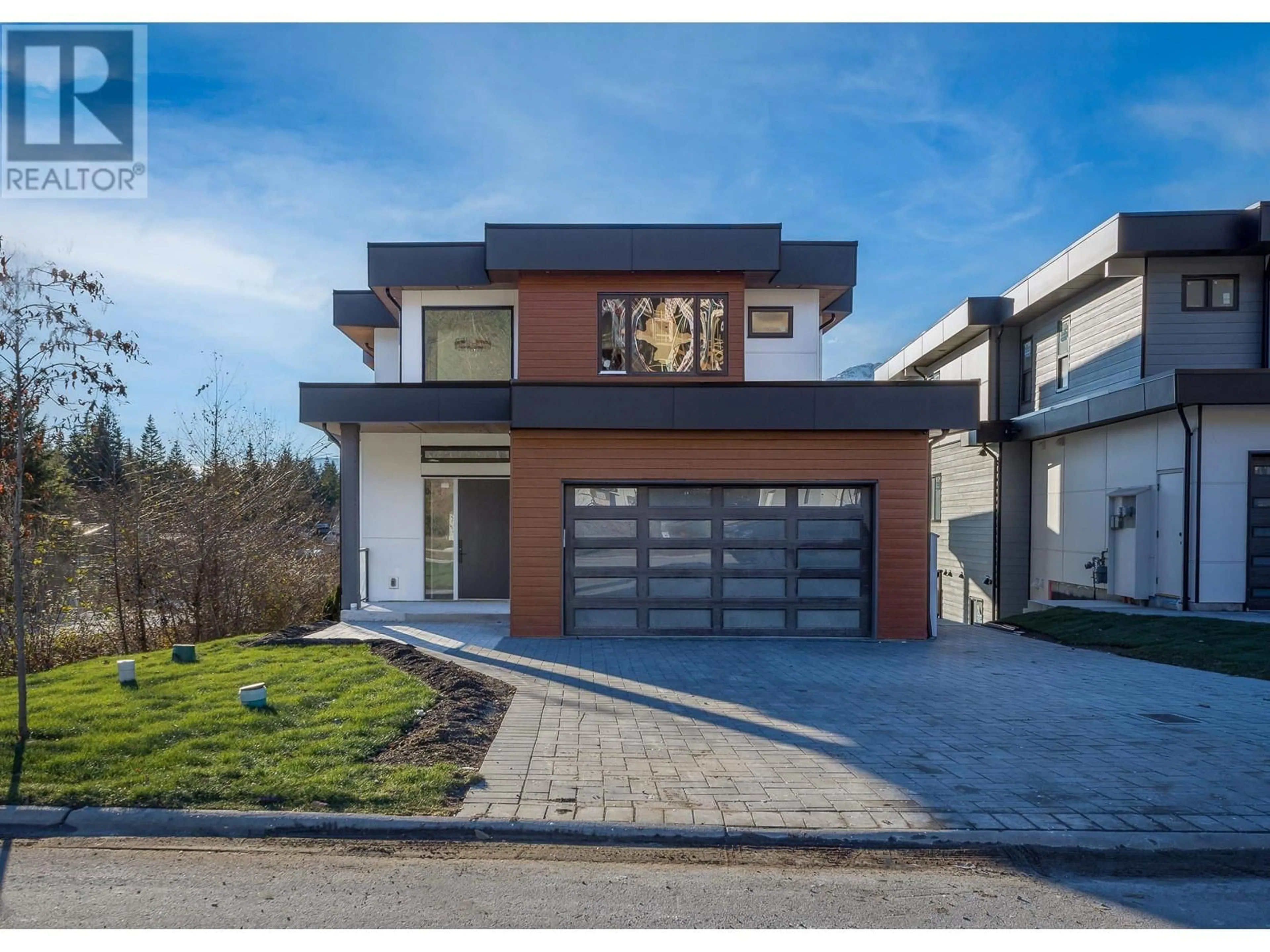 Home with brick exterior material, street for 1 - 3385 MAMQUAM ROAD, Squamish British Columbia V8B0E3