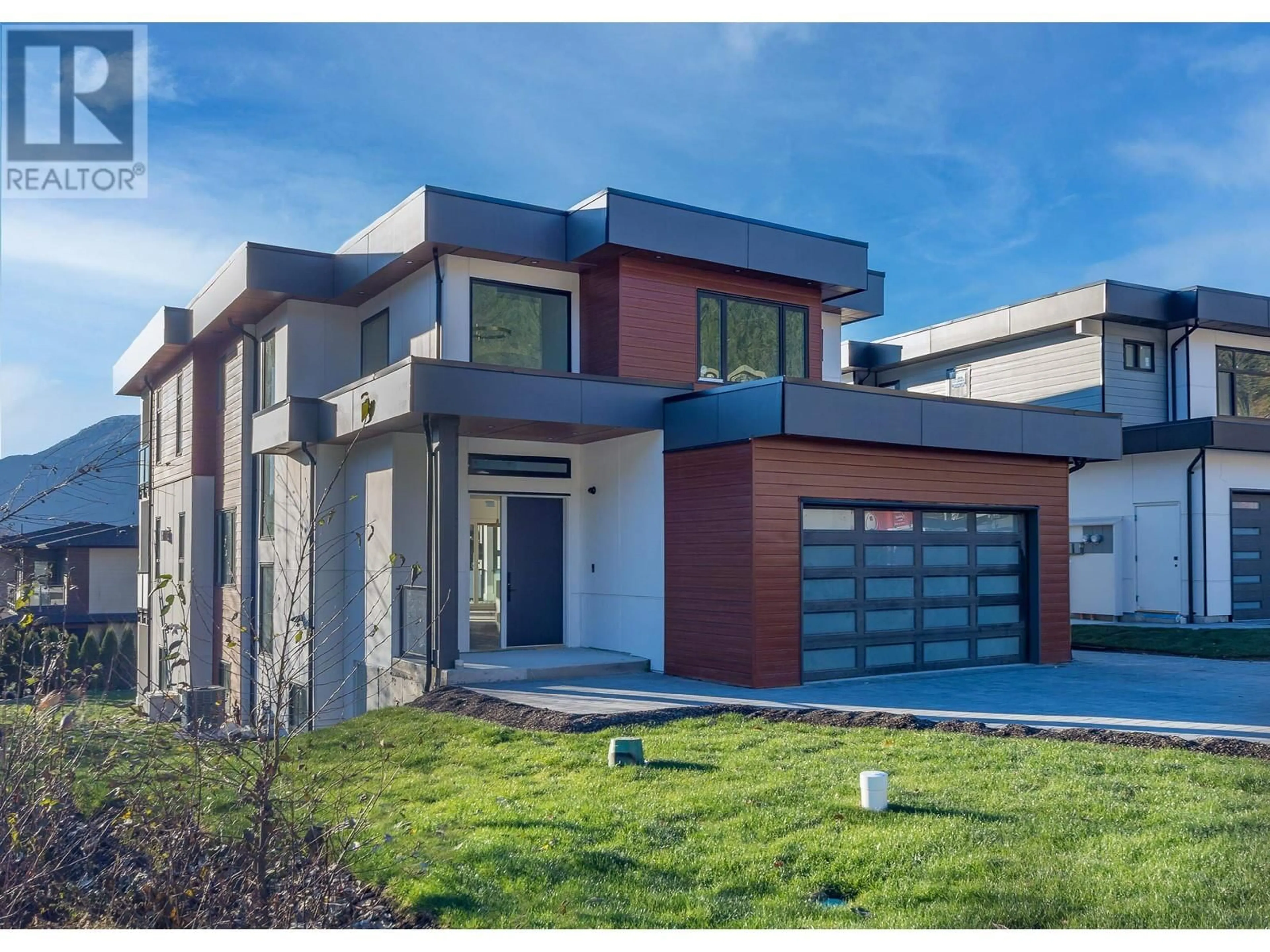 Home with brick exterior material, street for 1 - 3385 MAMQUAM ROAD, Squamish British Columbia V8B0E3