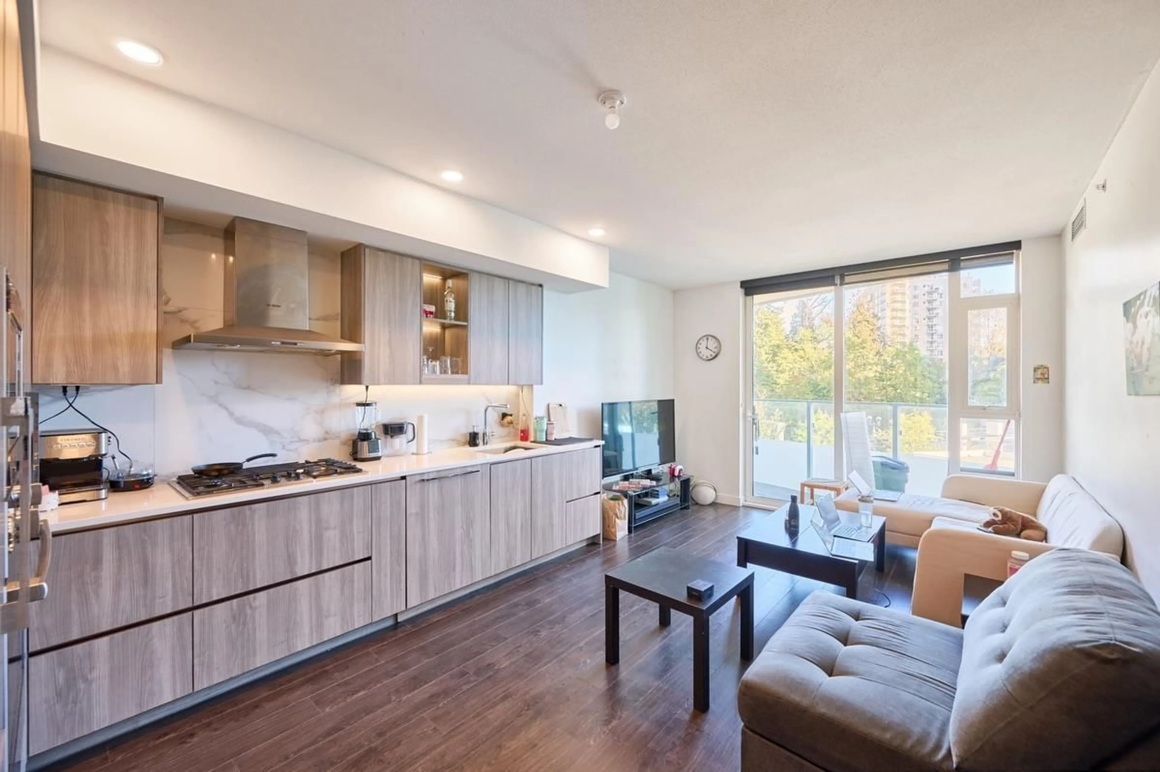 Open concept kitchen, wood/laminate floor for 308 - 9887 WHALLEY, Surrey British Columbia V3T0P4