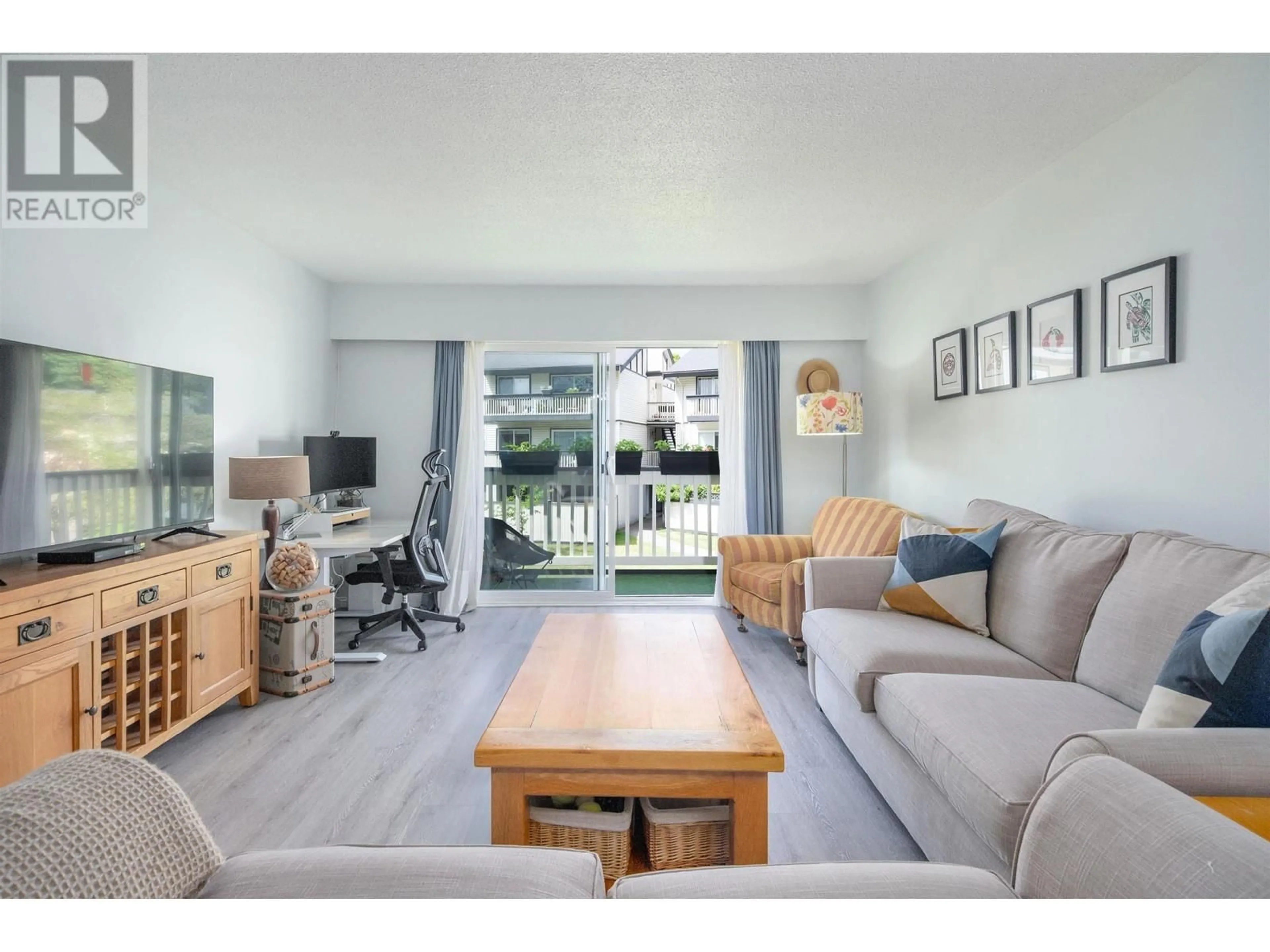 Living room with furniture, unknown for 216 - 780 PREMIER STREET, North Vancouver British Columbia V7J2G8