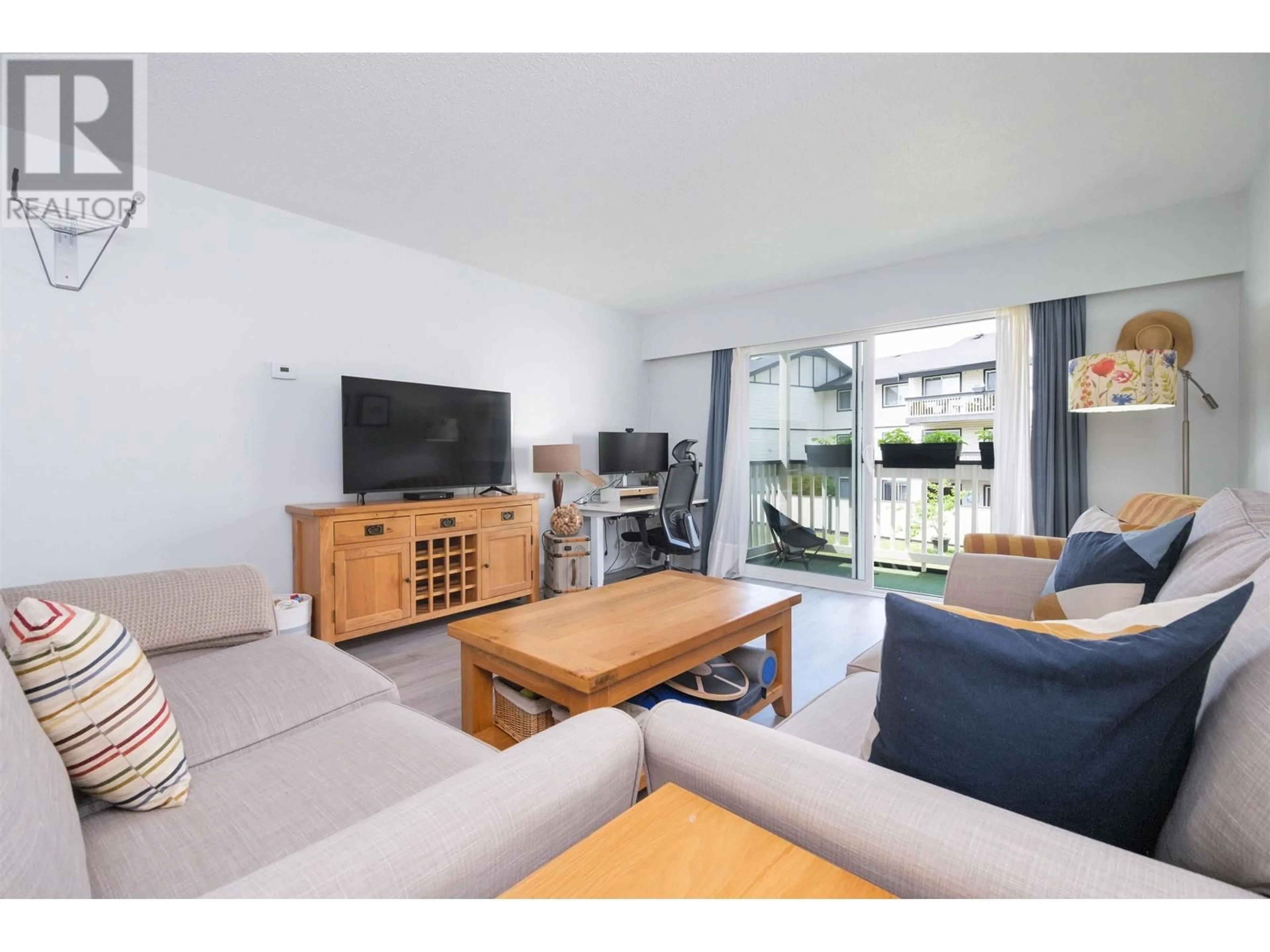 Living room with furniture, unknown for 216 - 780 PREMIER STREET, North Vancouver British Columbia V7J2G8
