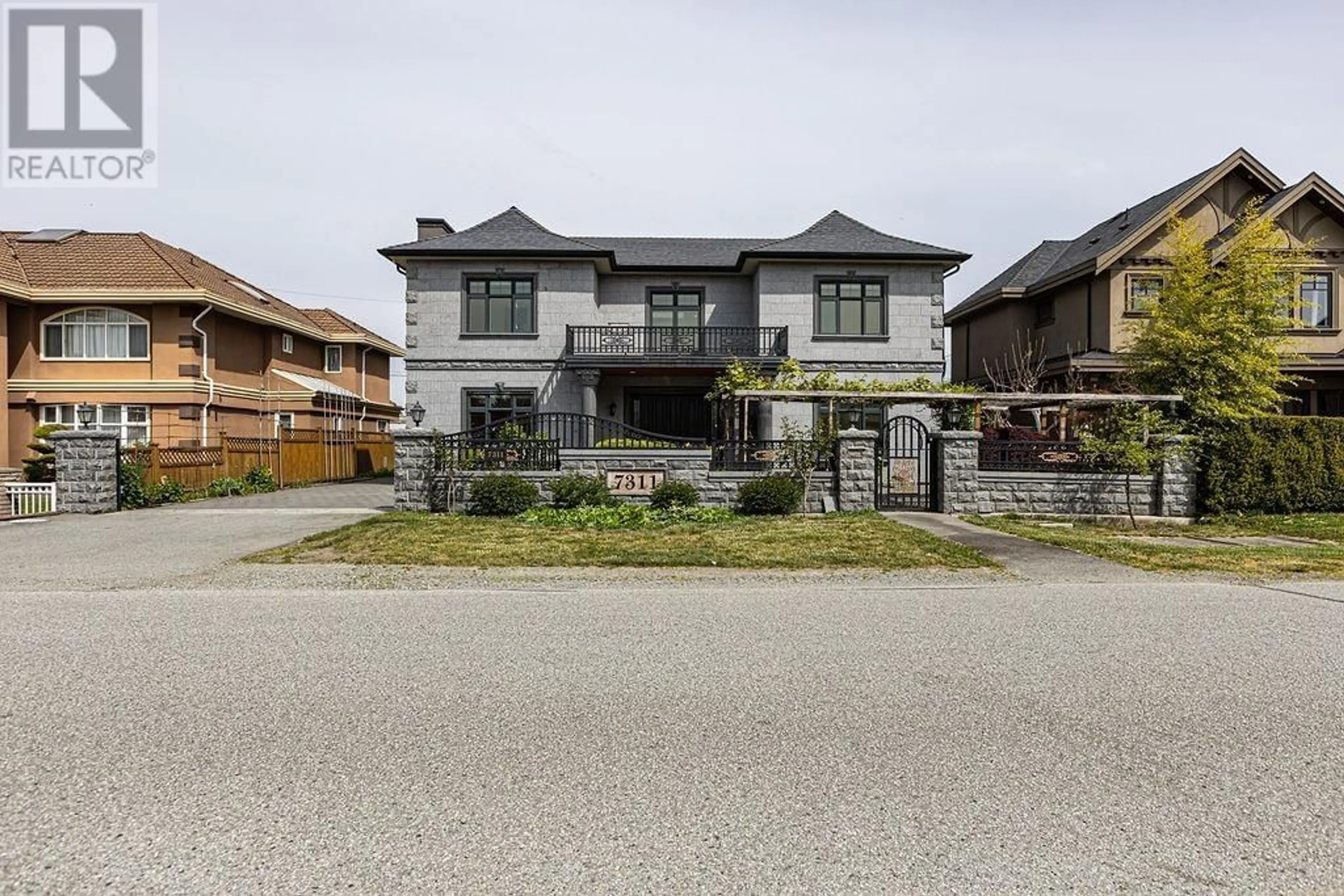Home with brick exterior material, street for 7311 BATES ROAD, Richmond British Columbia V7A1C8