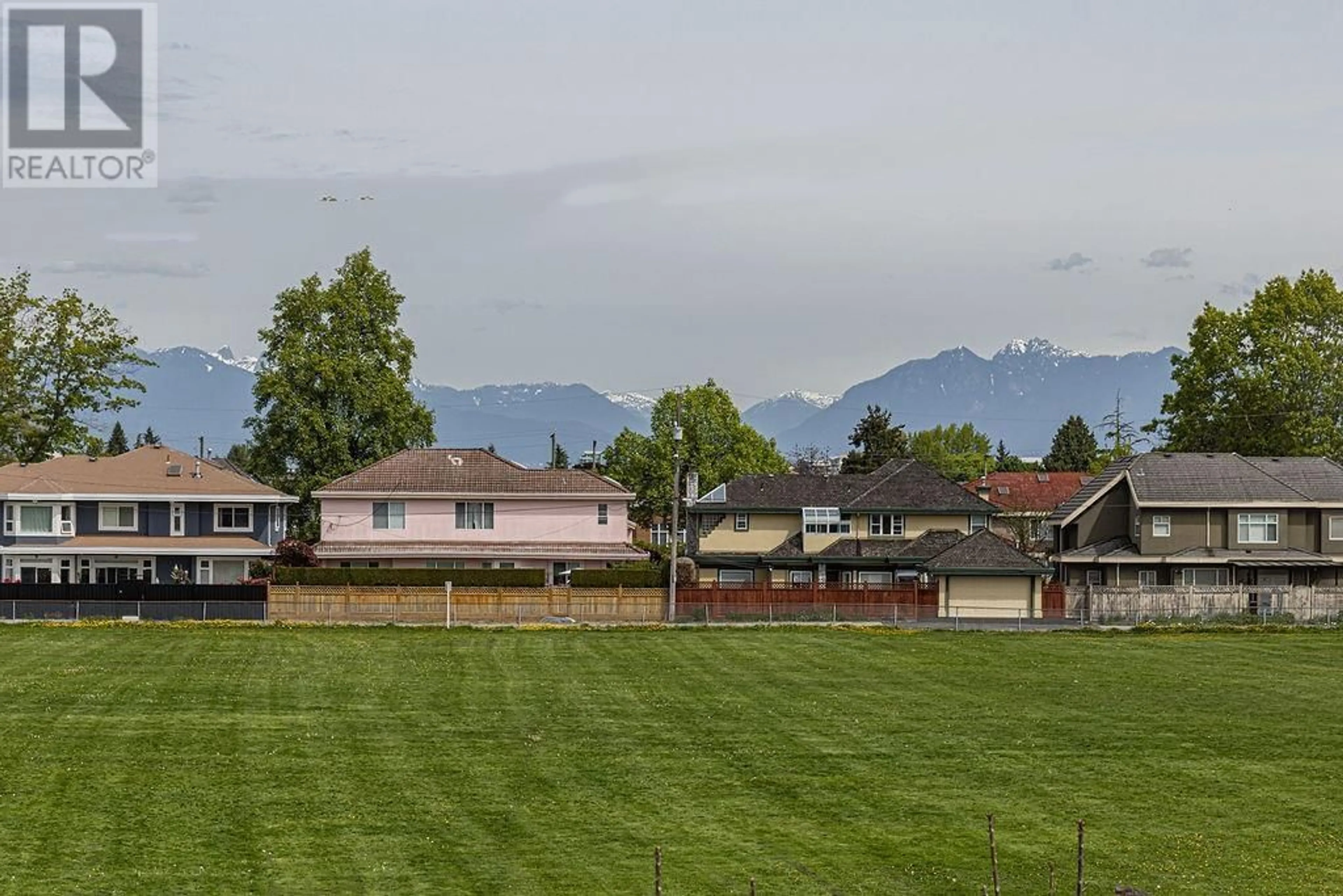 A pic from outside/outdoor area/front of a property/back of a property/a pic from drone, mountain view for 7311 BATES ROAD, Richmond British Columbia V7A1C8