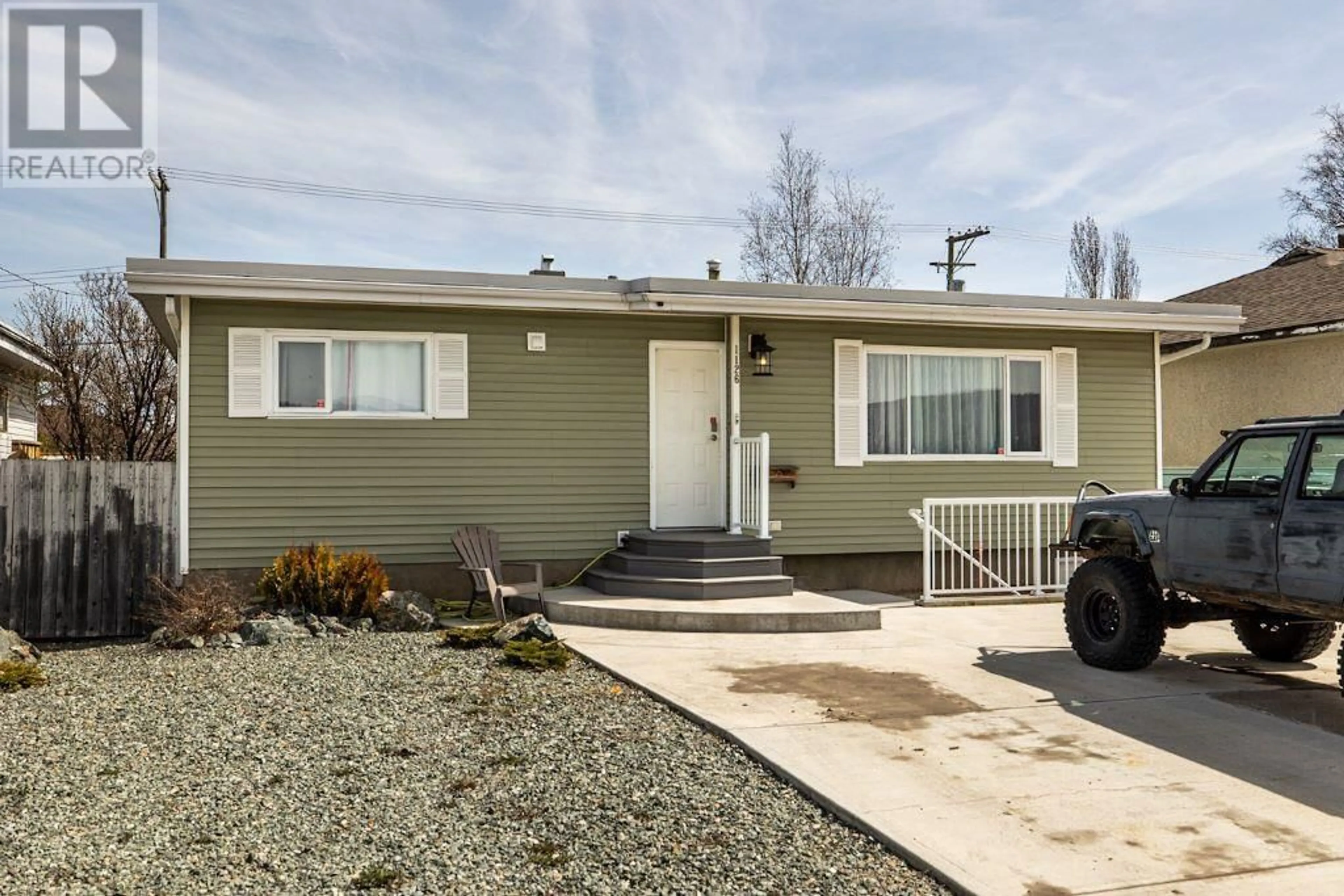 Home with vinyl exterior material, street for 1126 CENTRAL STREET, Prince George British Columbia V2M3B9
