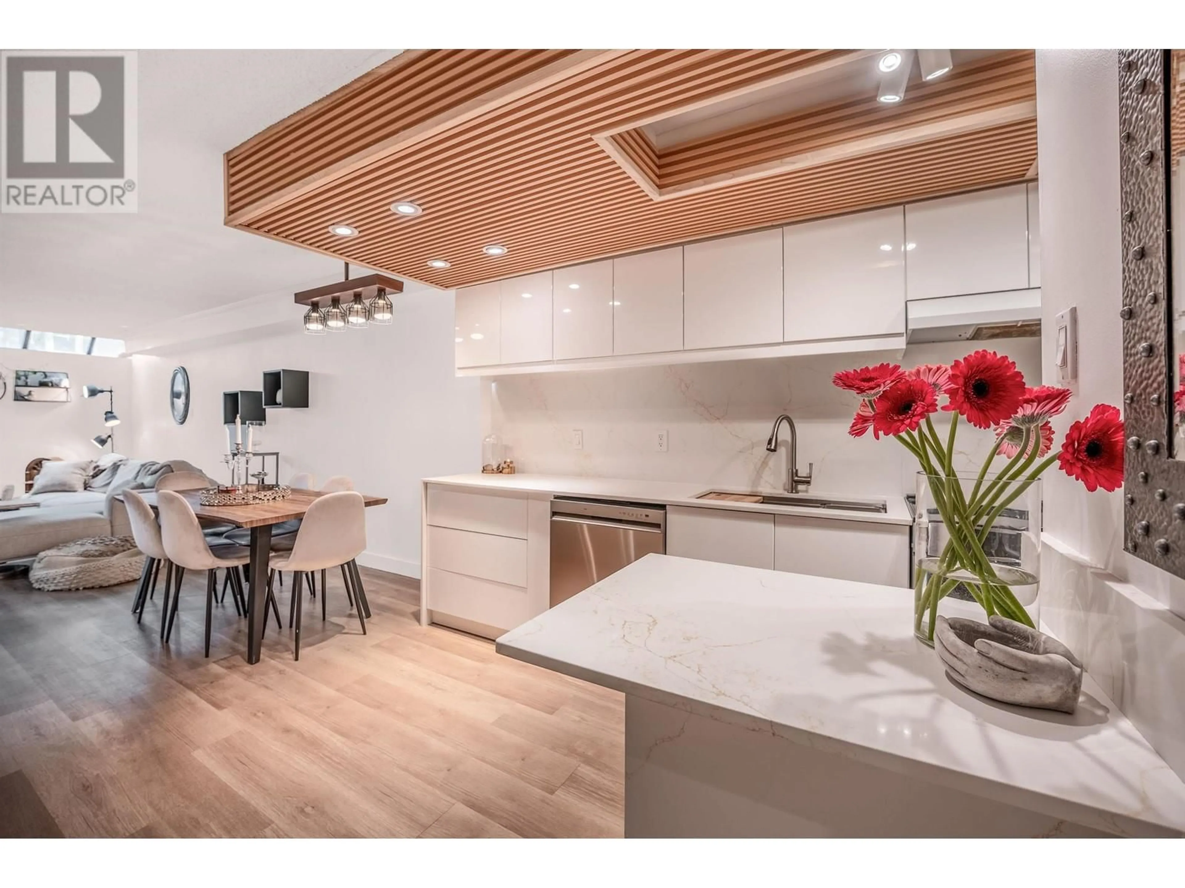 Open concept kitchen, wood/laminate floor for 216 - 1500 PENDRELL STREET, Vancouver British Columbia V6G3A5