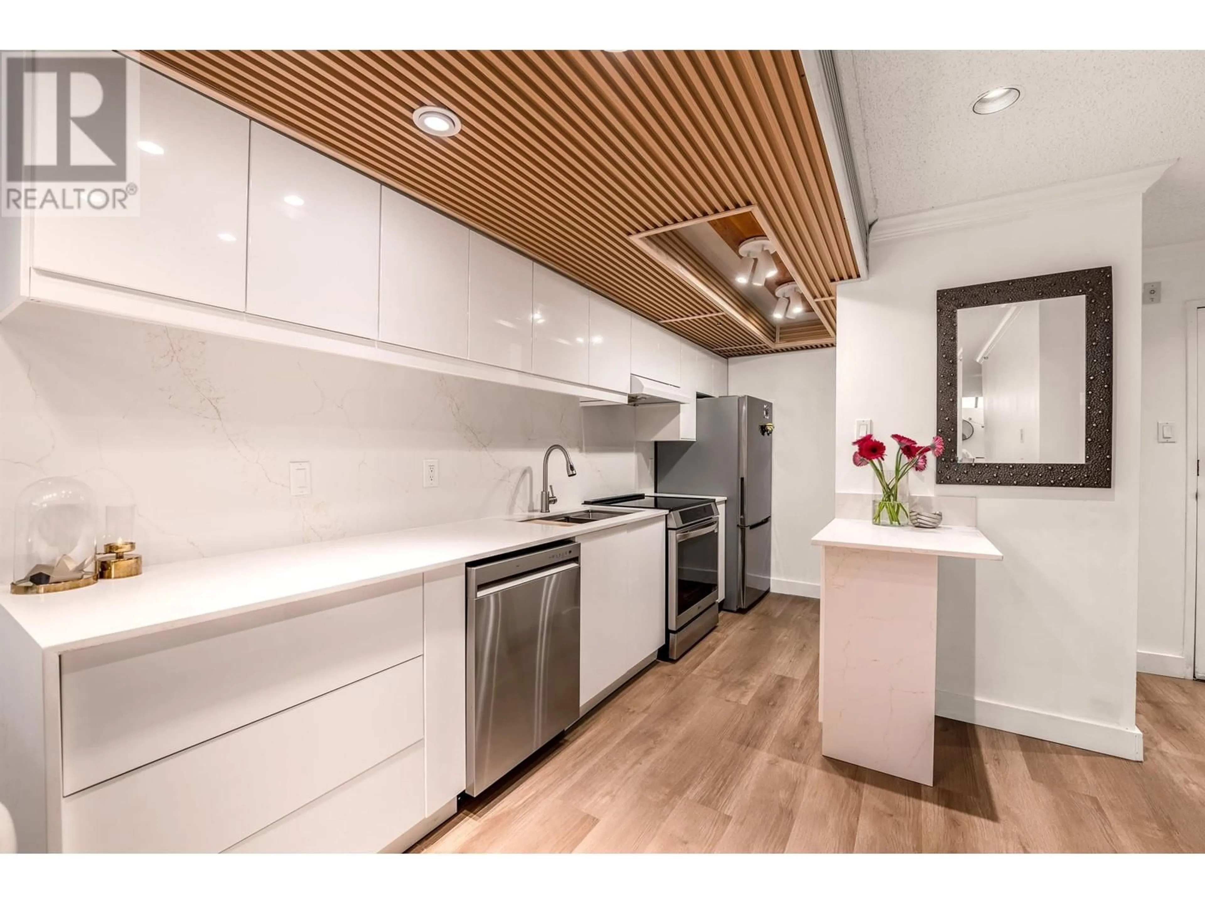 Contemporary kitchen, wood/laminate floor for 216 - 1500 PENDRELL STREET, Vancouver British Columbia V6G3A5