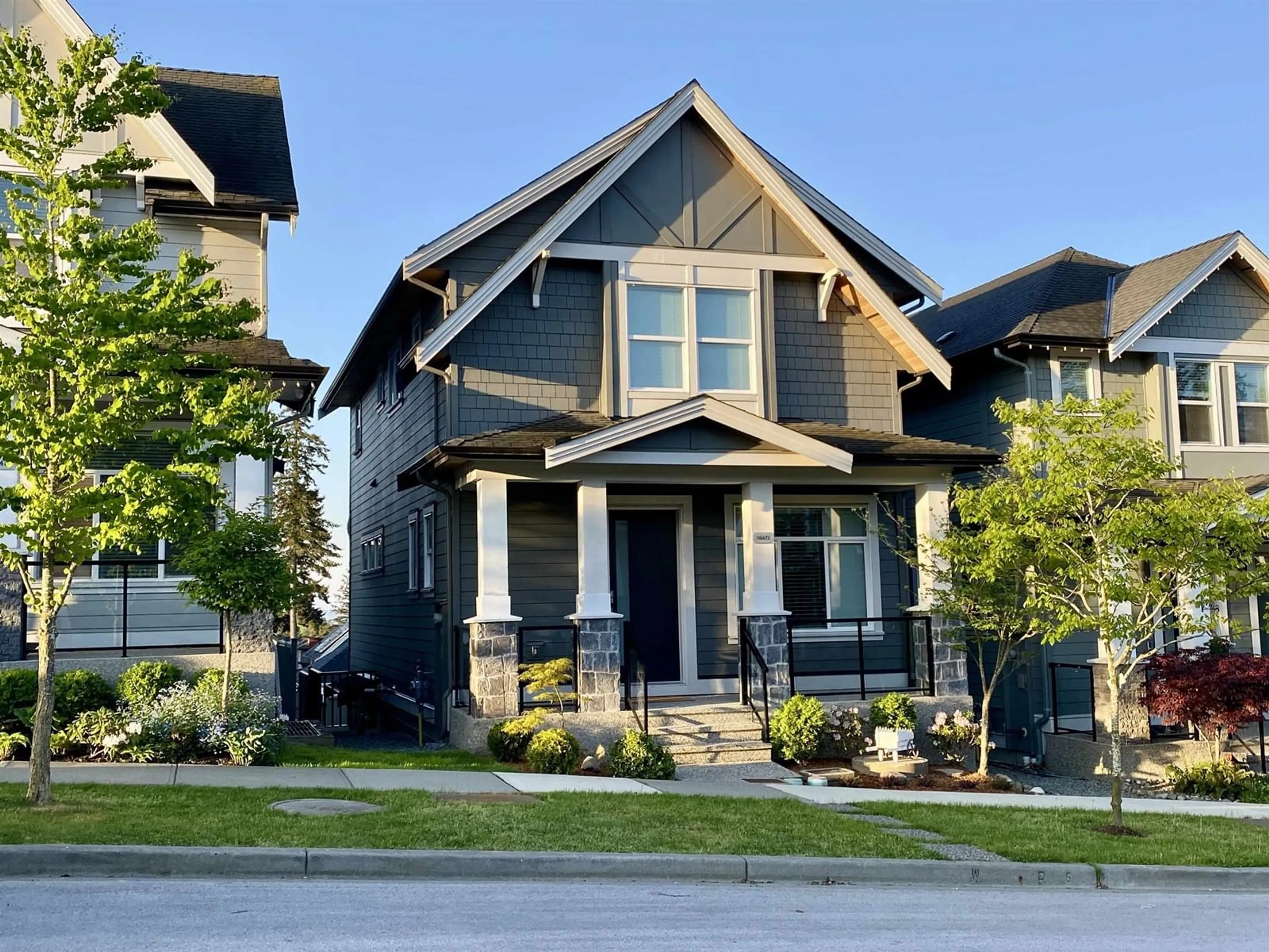 Home with vinyl exterior material, street for 16470 21A, Surrey British Columbia V3Z0V5