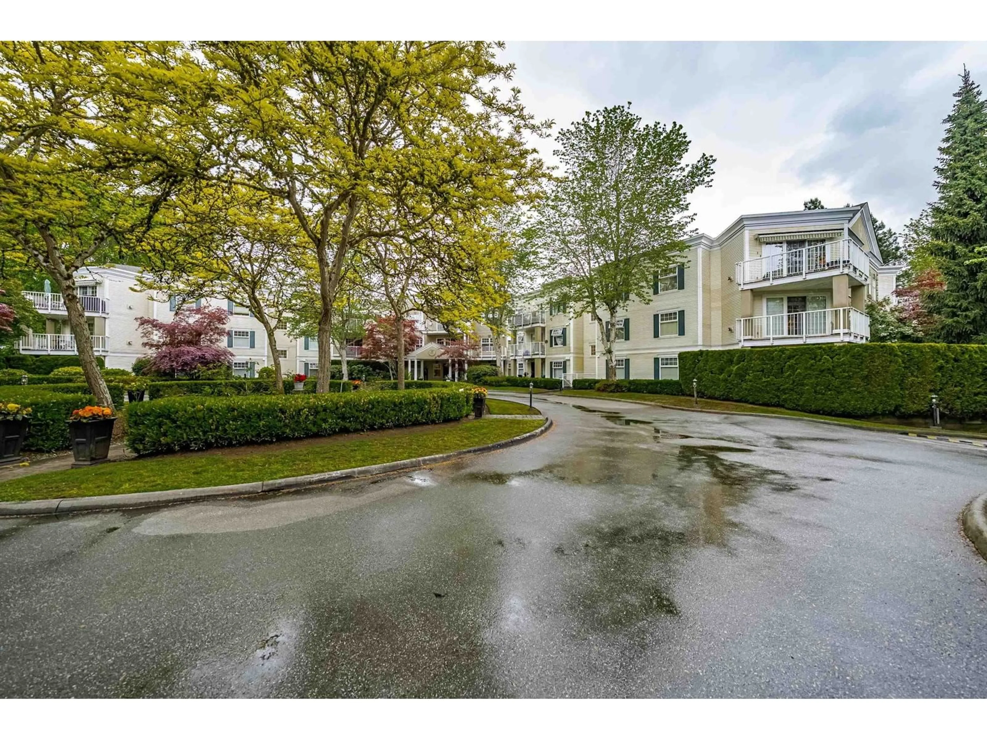 A pic from outside/outdoor area/front of a property/back of a property/a pic from drone, street for 211 - 16085 83RD, Surrey British Columbia V4N0N2