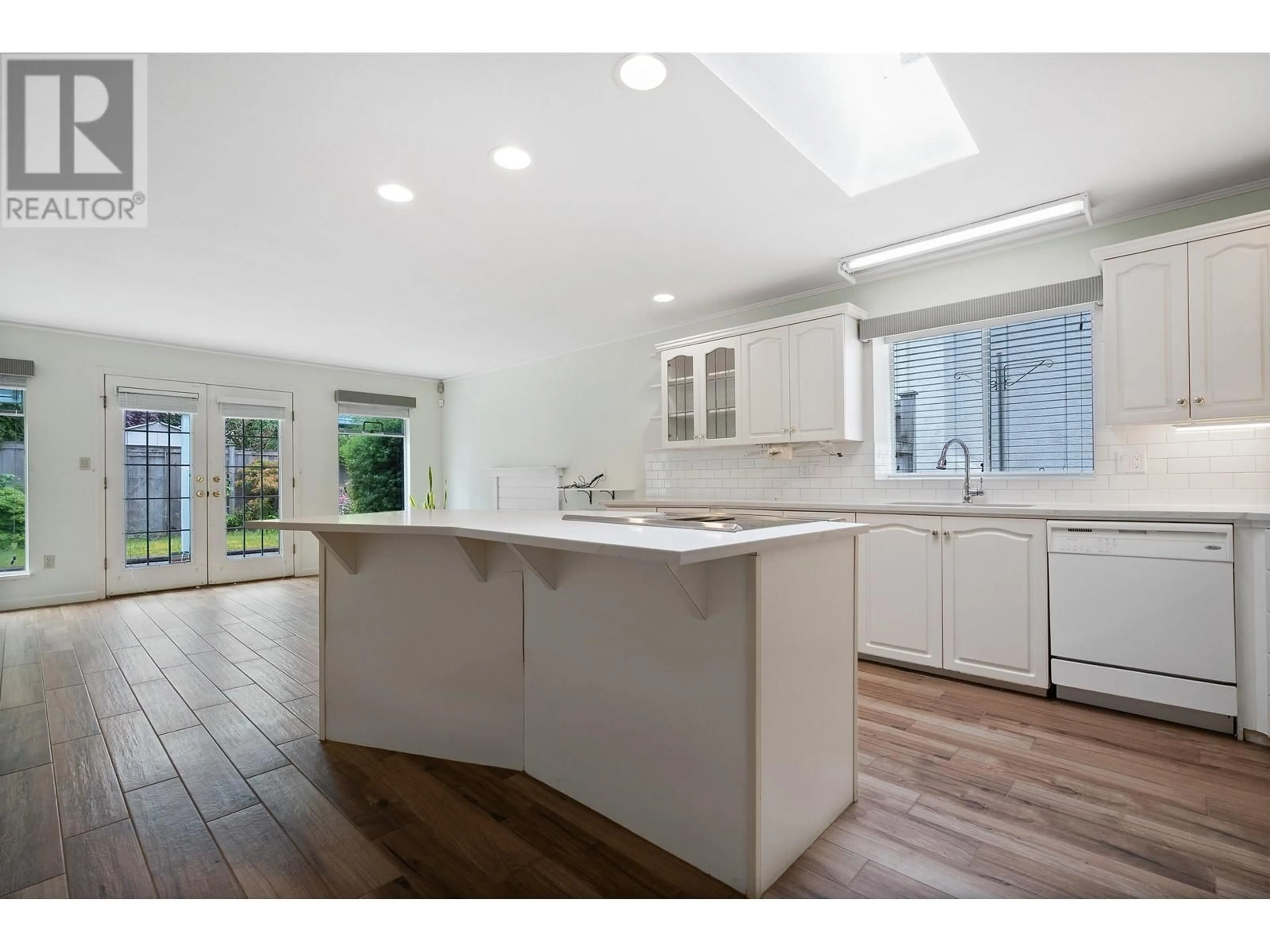 Open concept kitchen, ceramic/tile floor for 4497 63 STREET, Delta British Columbia V4K4T5