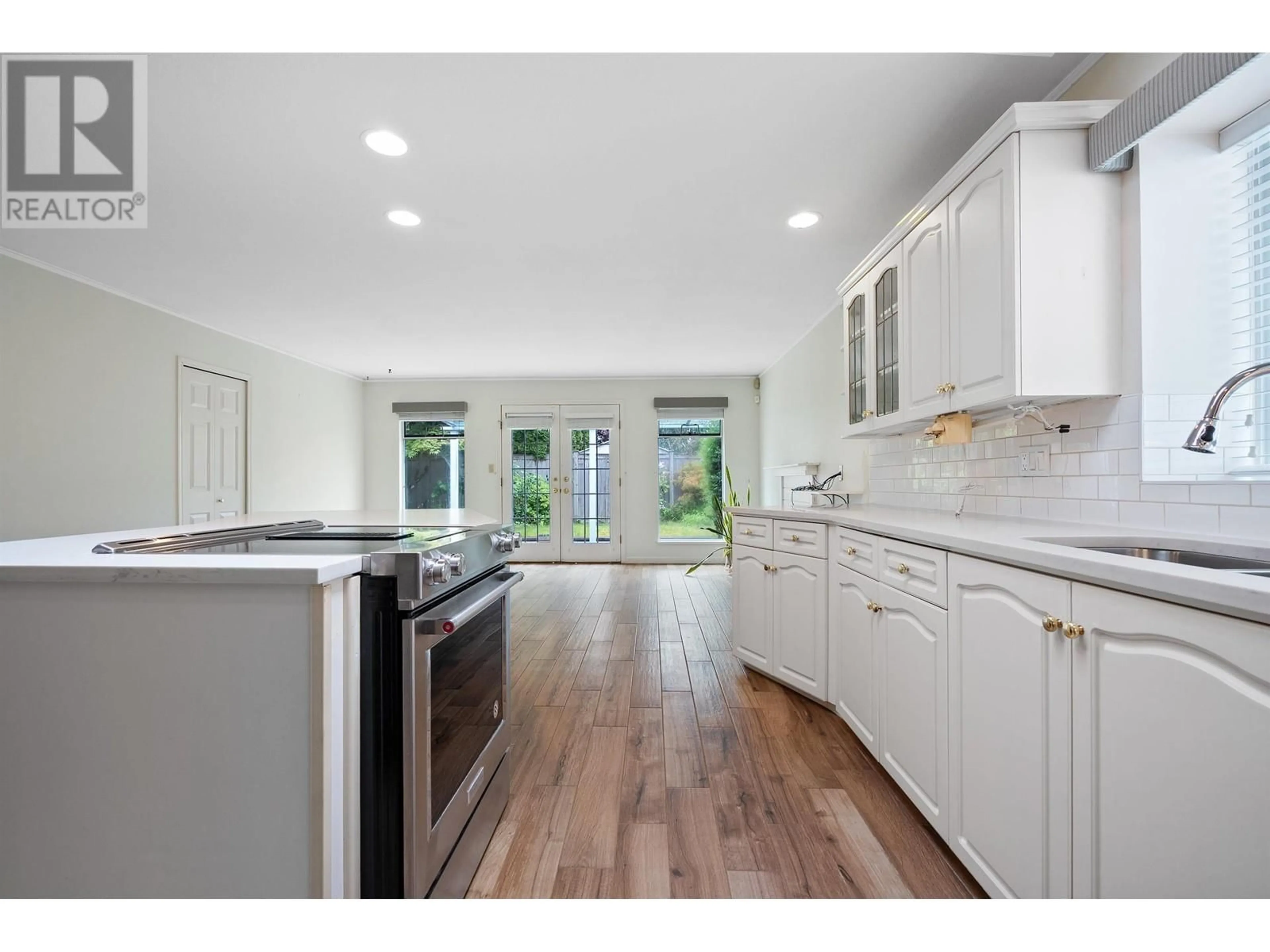Open concept kitchen, ceramic/tile floor for 4497 63 STREET, Delta British Columbia V4K4T5
