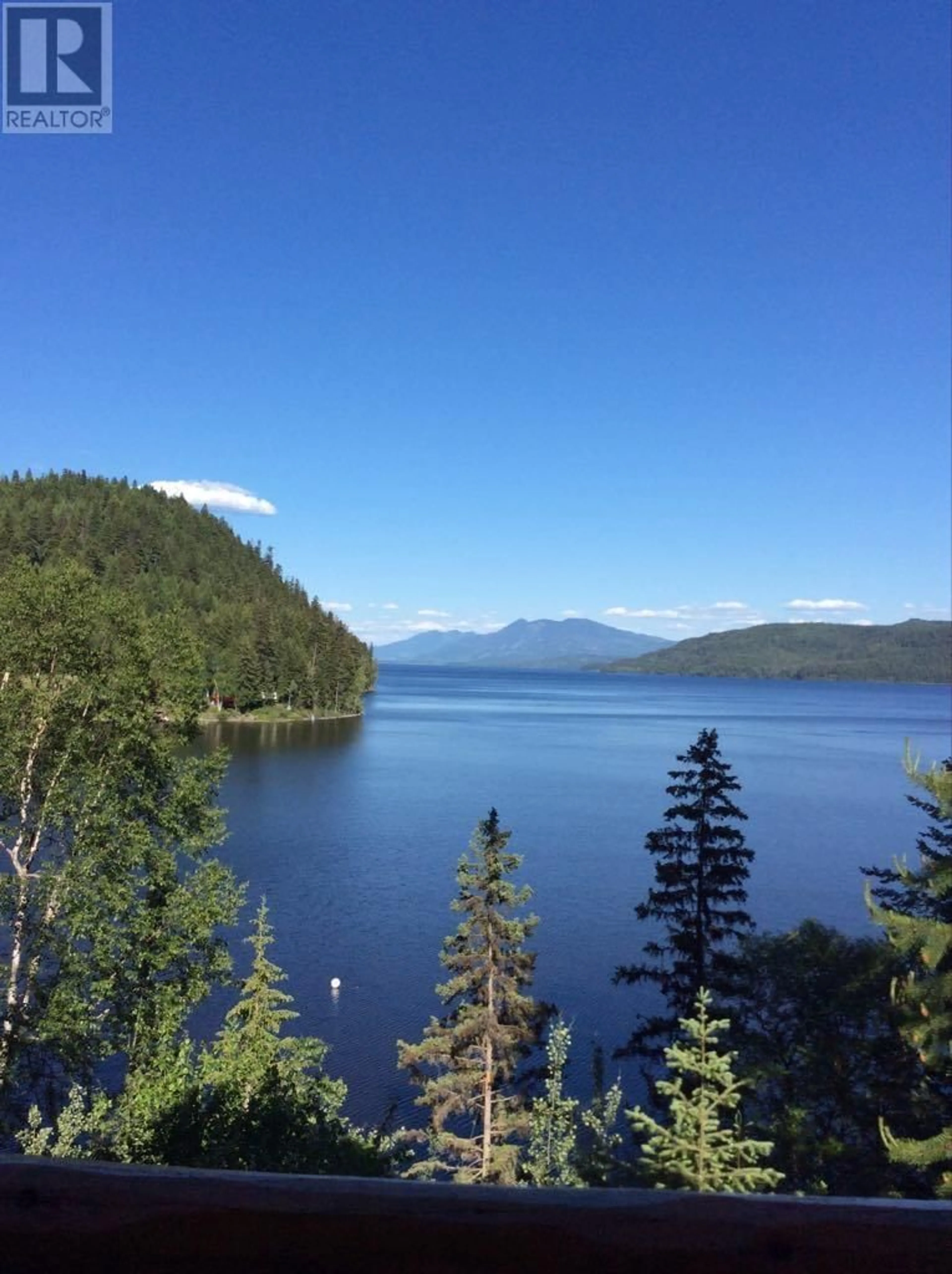 A pic from outside/outdoor area/front of a property/back of a property/a pic from drone, water/lake/river/ocean view for 7456 COTTONWOOD PLACE, 100 Mile House British Columbia V0K1L0