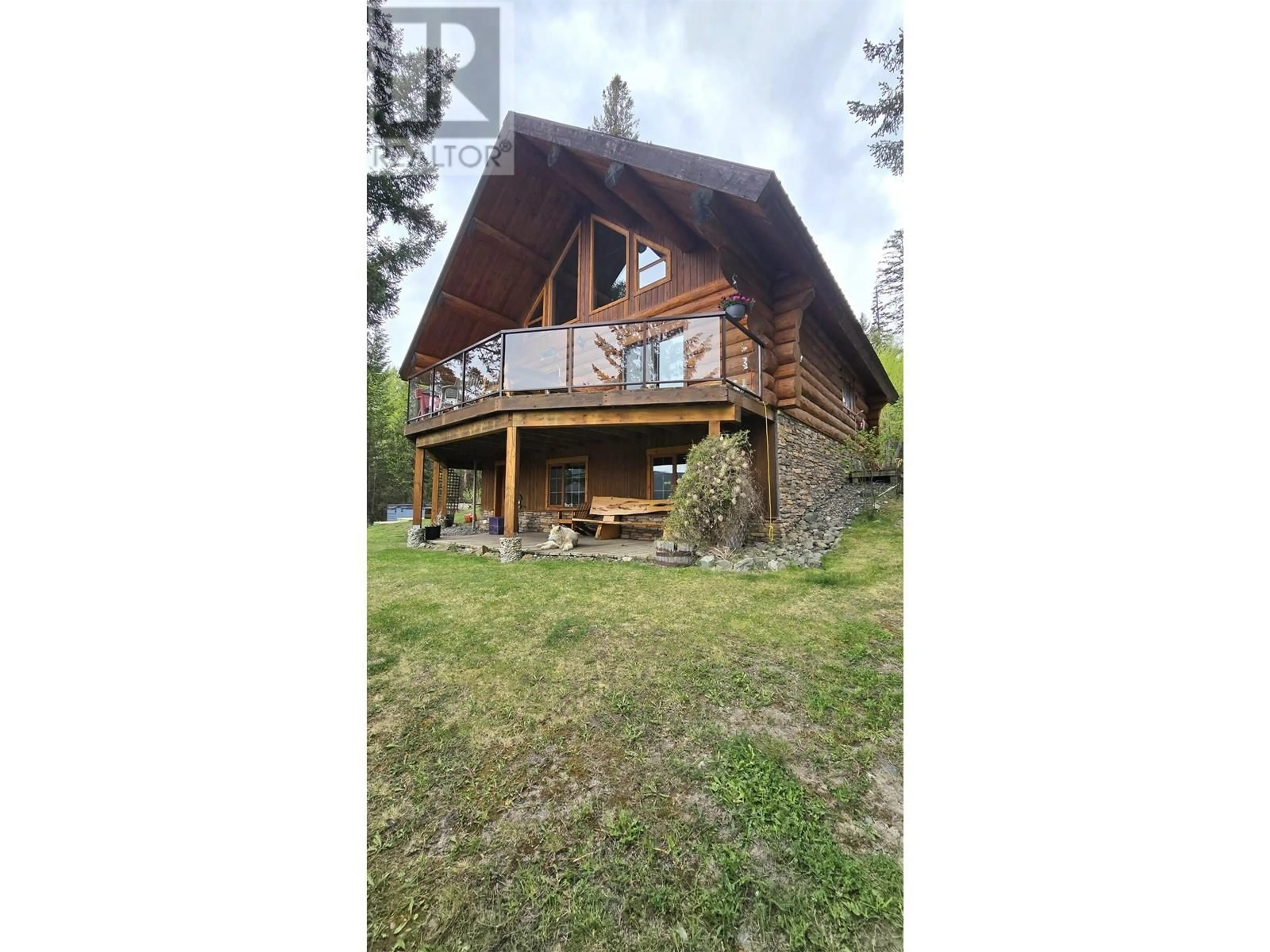 A pic from outside/outdoor area/front of a property/back of a property/a pic from drone, building for 7456 COTTONWOOD PLACE, 100 Mile House British Columbia V0K1L0